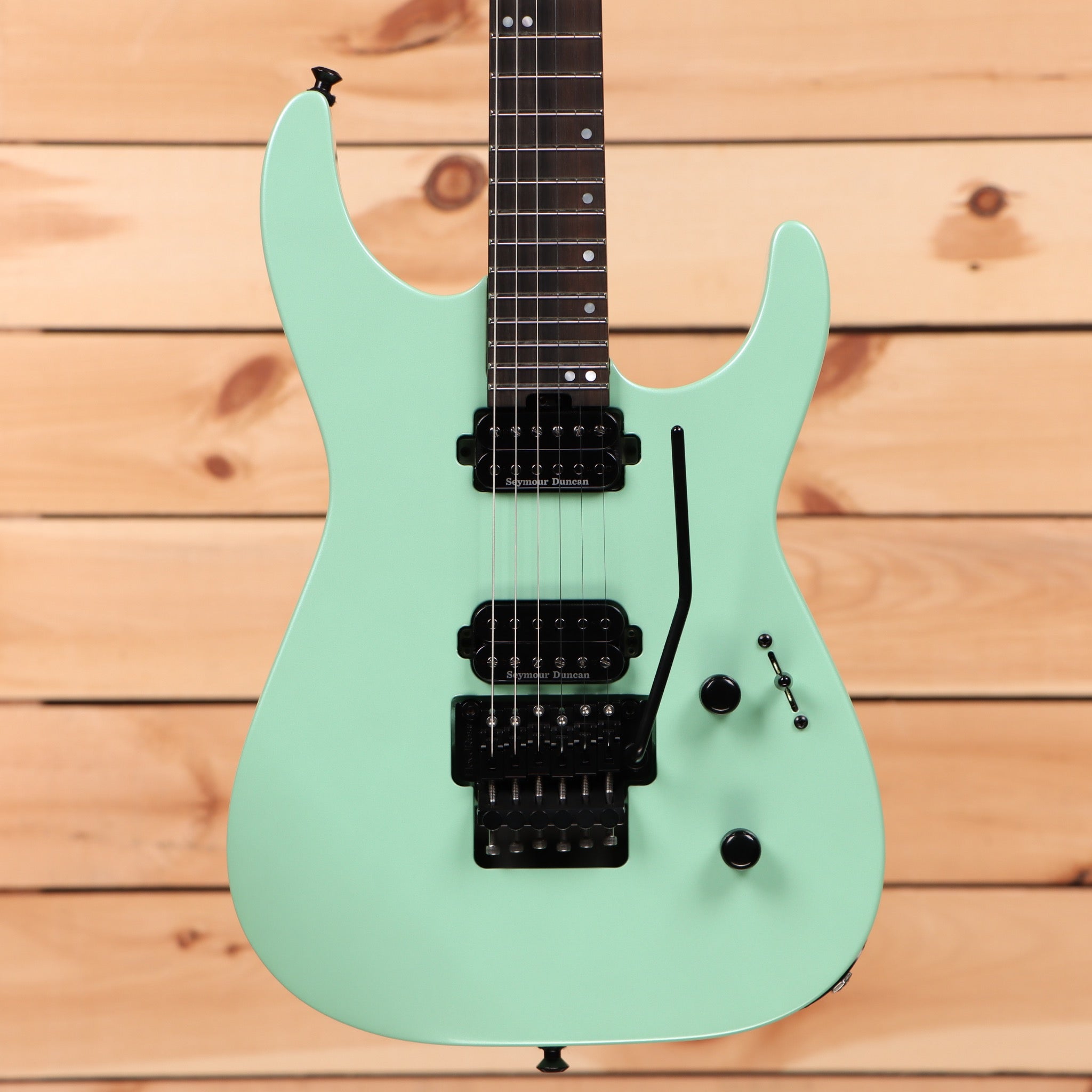 Jackson American Series Virtuoso electric guitar ocean finish with Seymour Duncan humbuckers and Floyd Rose tremolo