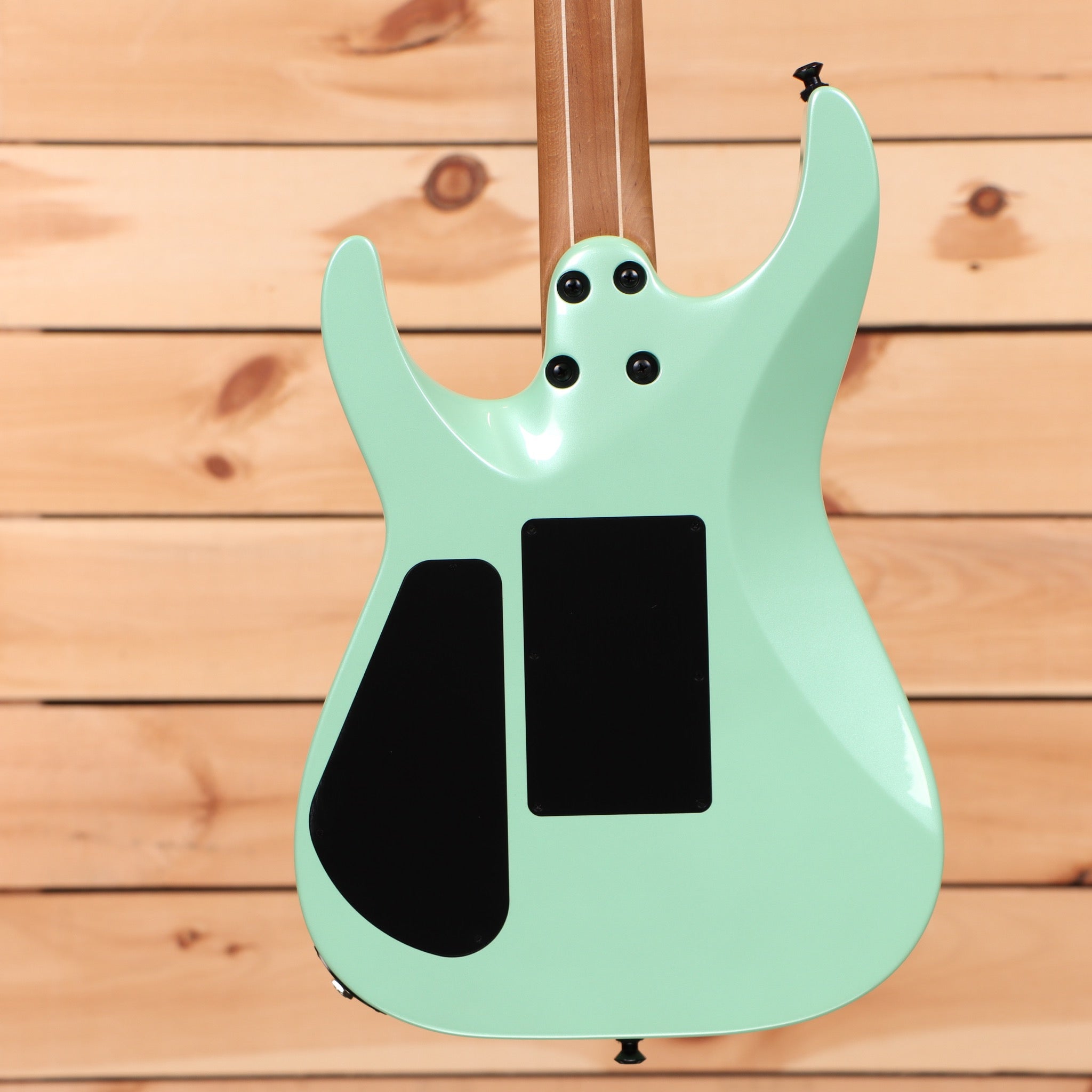 Jackson American Series Virtuoso electric guitar Ocean finish with dual humbuckers and double cutaway body