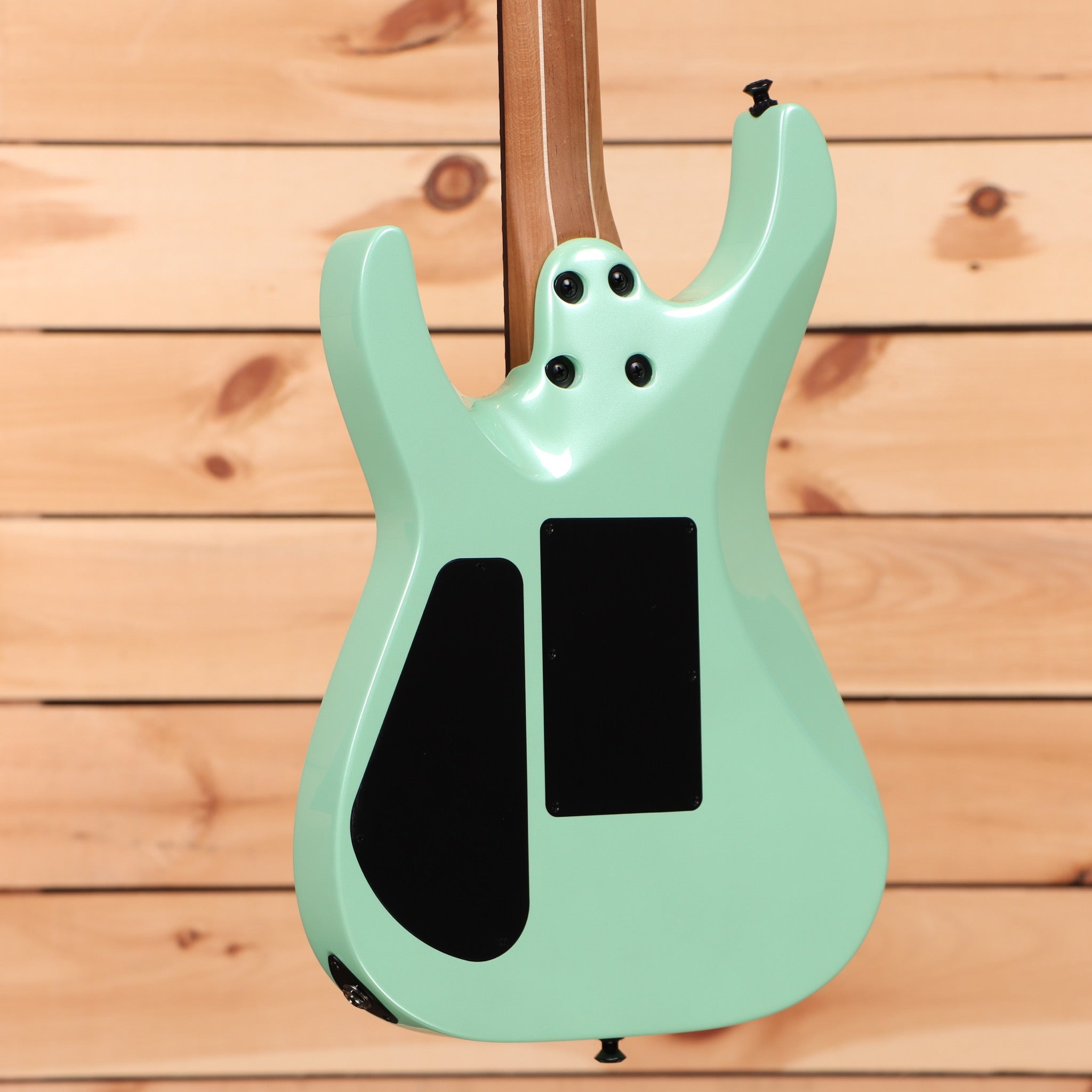 Jackson American Series Virtuoso electric guitar Ocean finish with dual humbucker pickups and maple neck