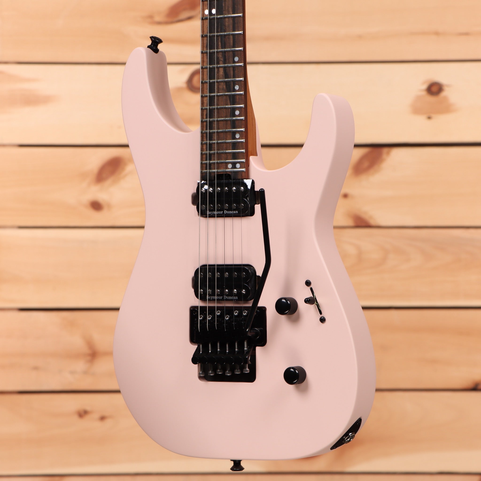 Jackson American Series Virtuoso Satin Shell Pink electric guitar with humbucker pickups