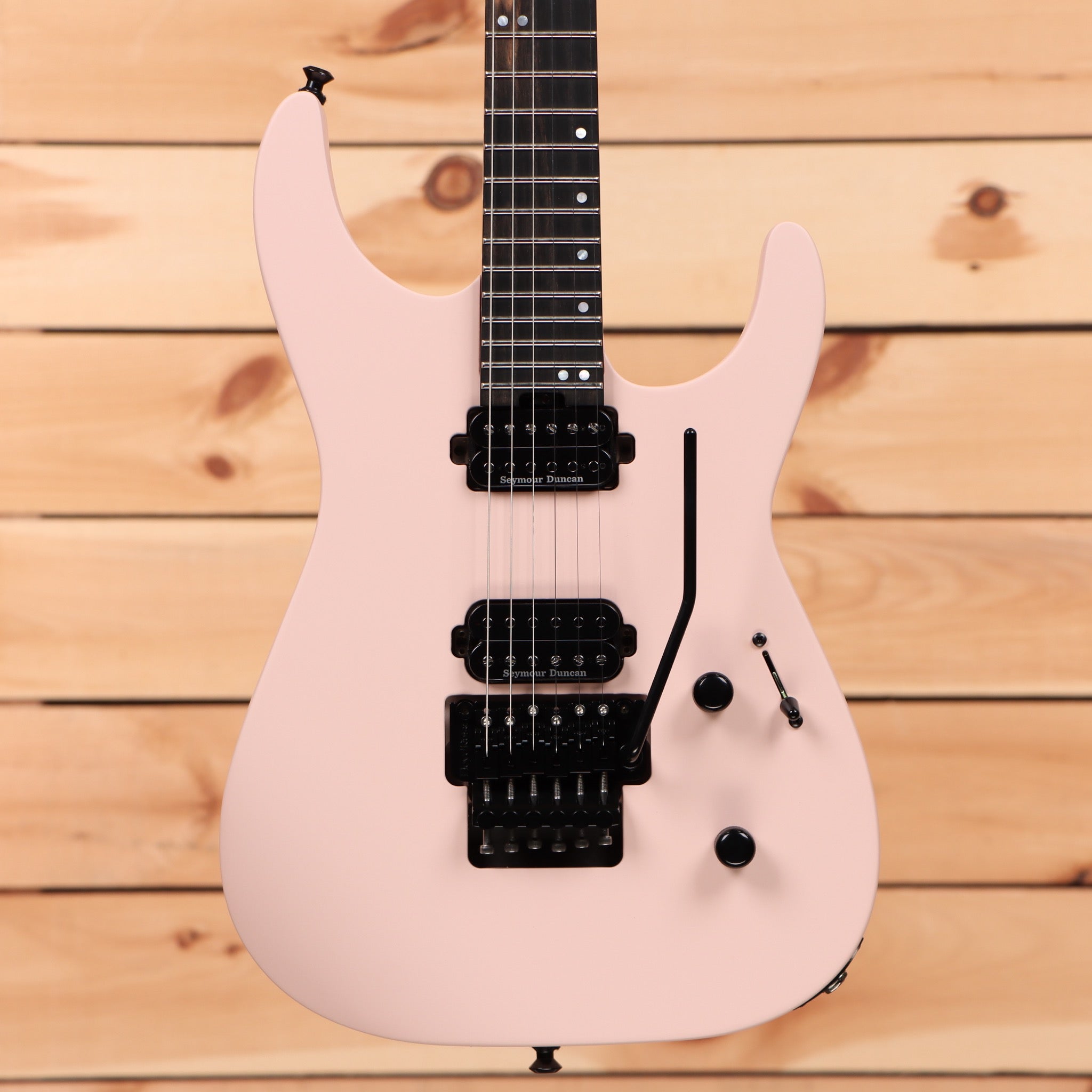 Jackson American Series Virtuoso Satin Shell Pink electric guitar with Floyd Rose tremolo and Seymour Duncan humbuckers