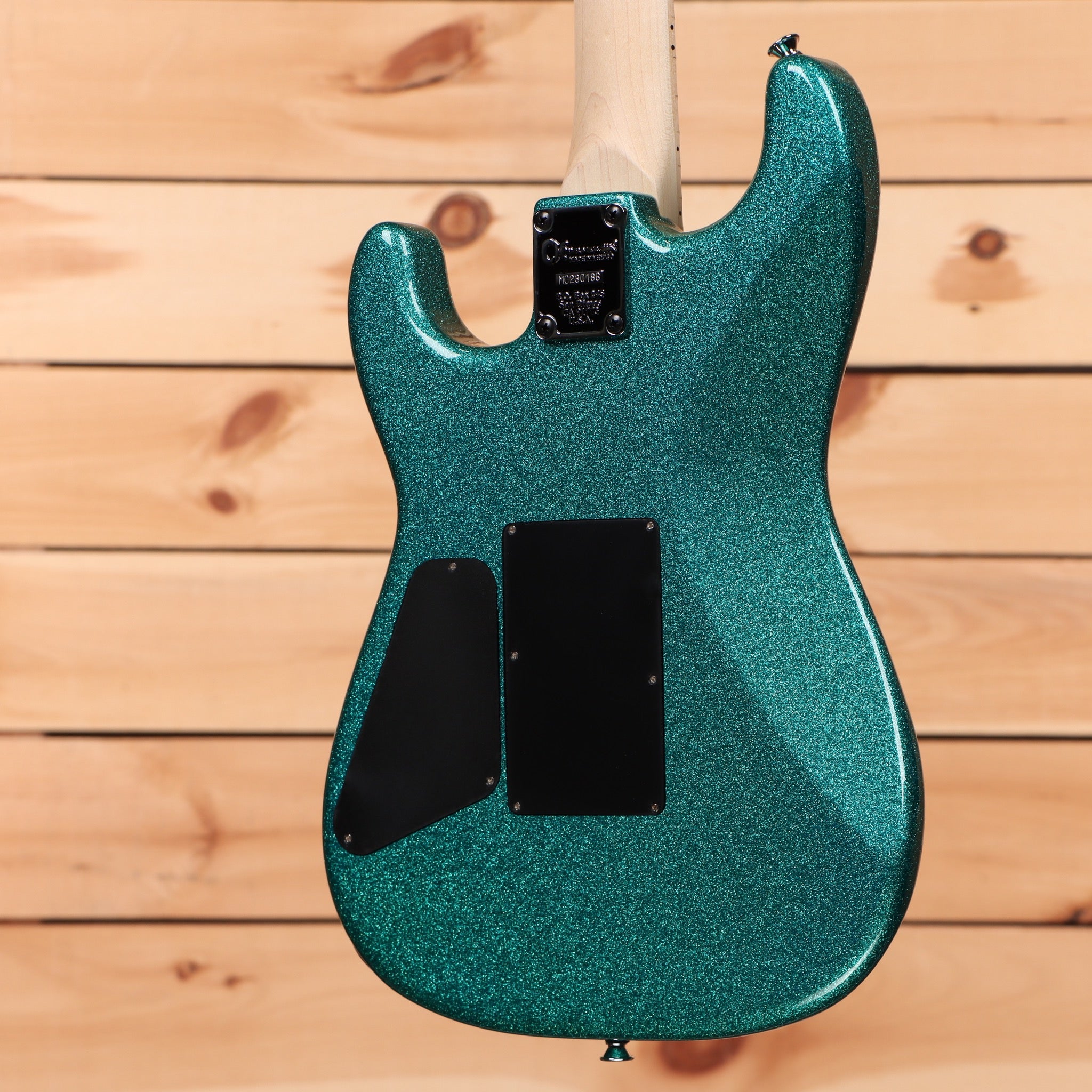 Charvel ProMod San Dimas Style 1 HSS FR electric guitar Aqua Flake with black pickguard and tremolo bridge