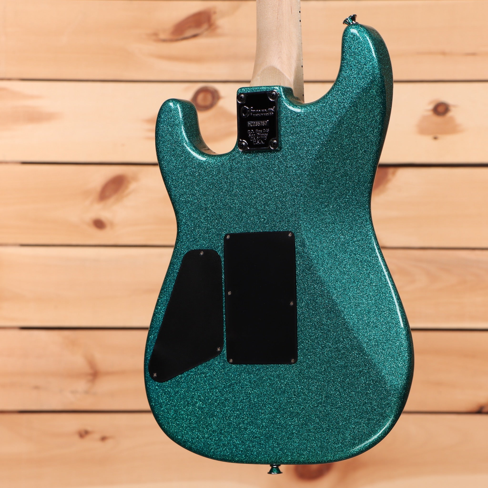 Charvel ProMod San Dimas Style 1 HSS FR-M electric guitar Aqua Flake with black pickguard and tremolo bridge