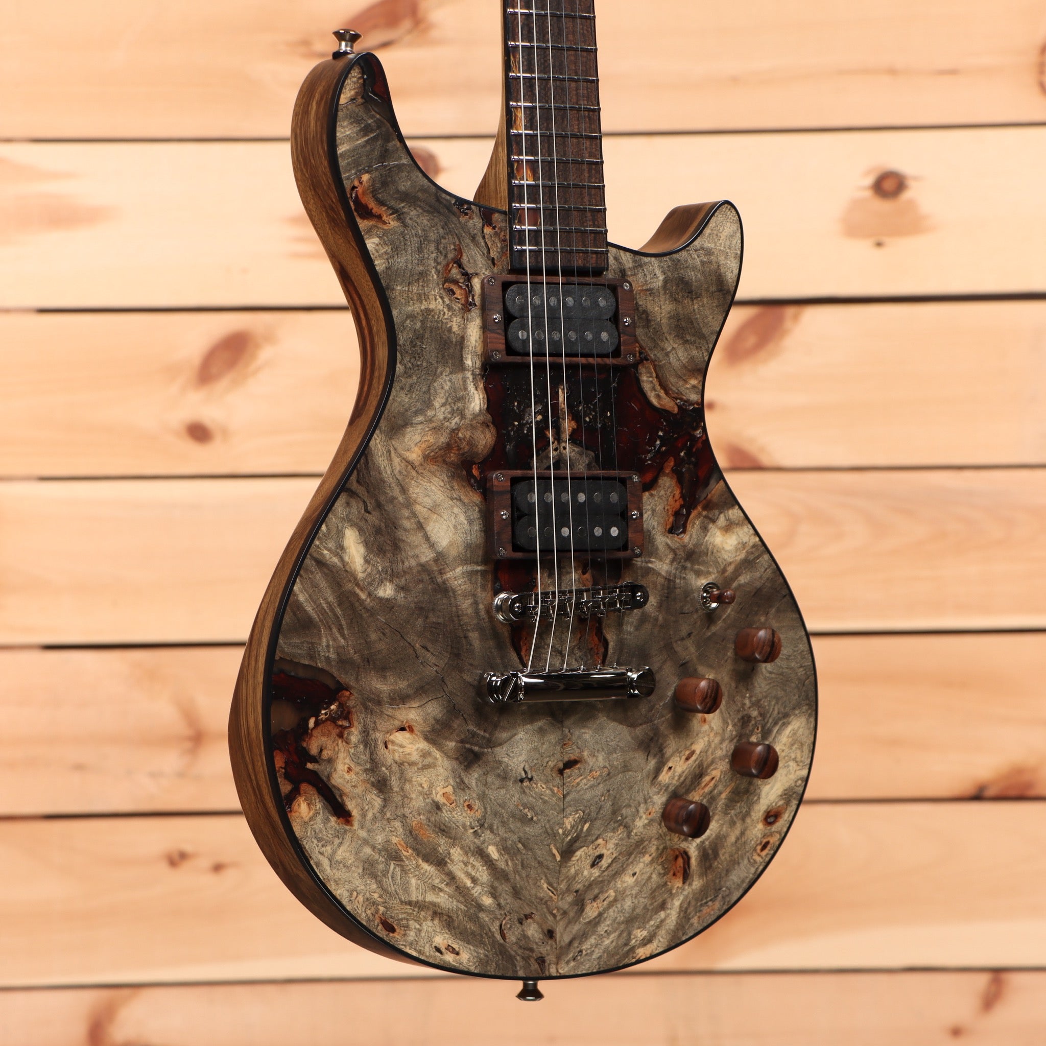 B3 SL Custom Deluxe electric guitar natural finish with dual humbucker pickups and figured body