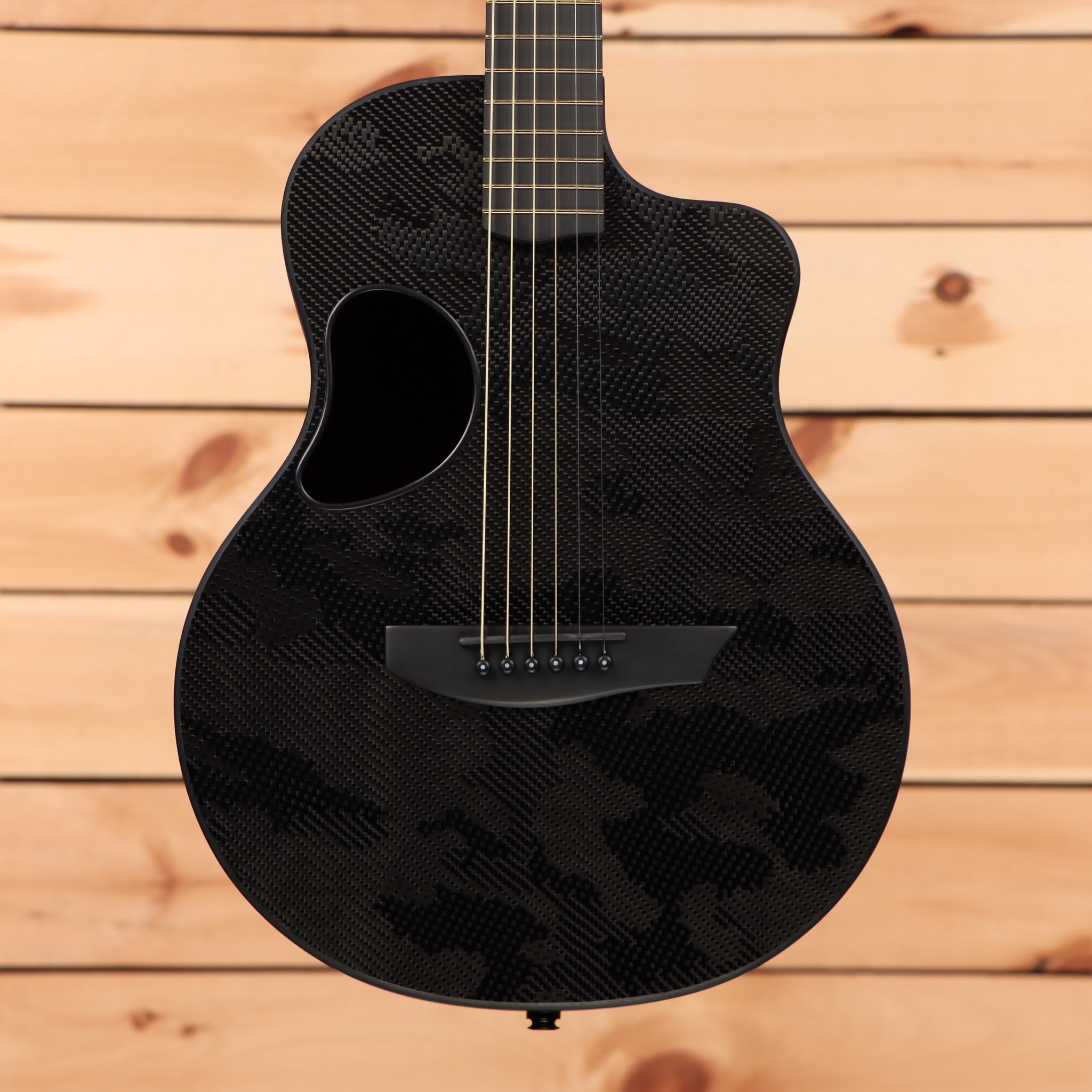 McPherson Carbon Touring Camo acoustic guitar carbon fiber construction with cutaway body