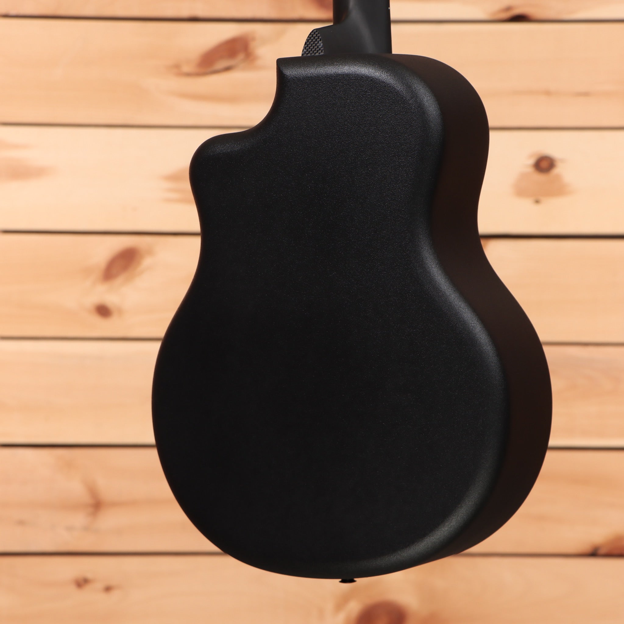 McPherson Carbon Touring Camo acoustic guitar with carbon fiber construction and contoured body