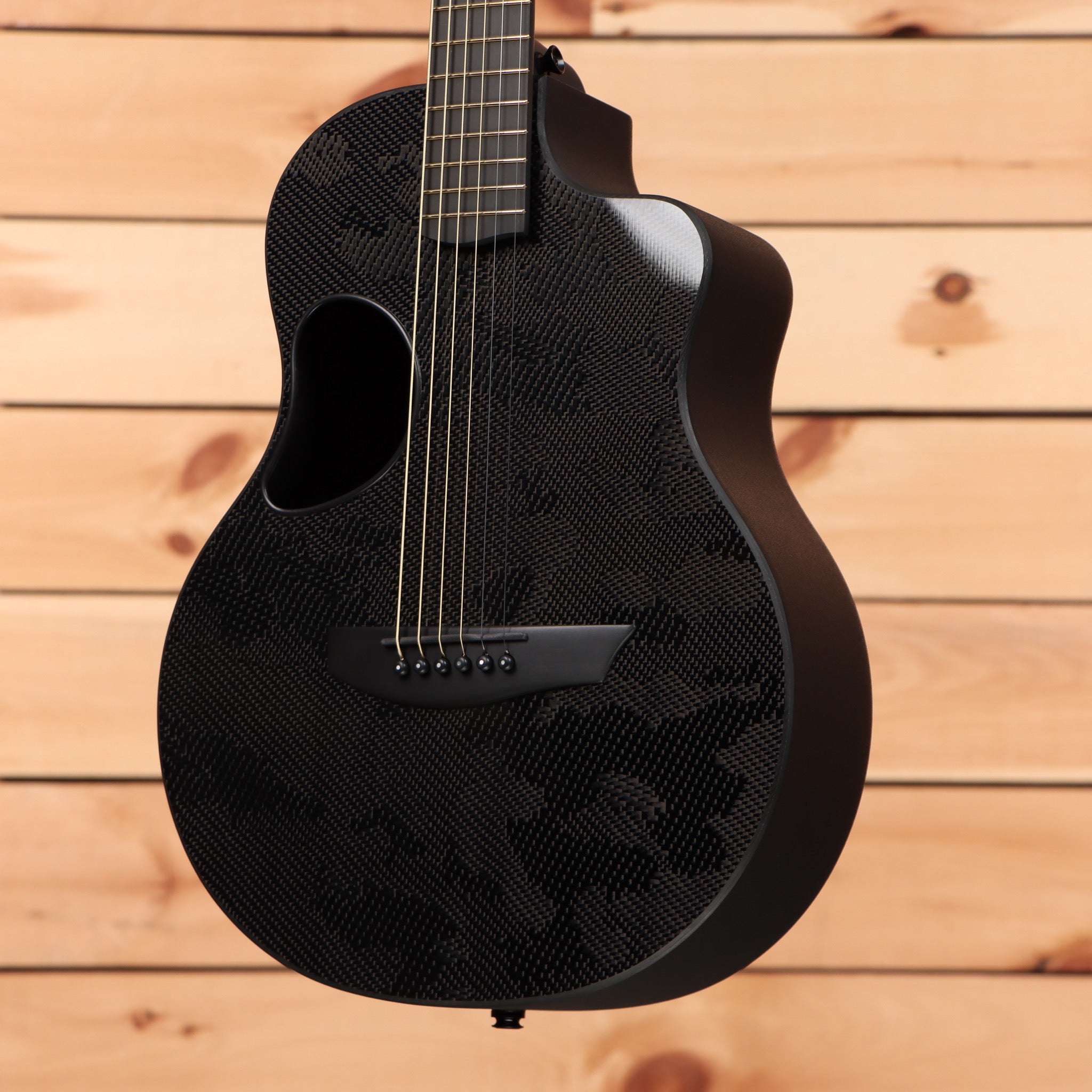 McPherson Carbon Touring Camo acoustic guitar with carbon fiber construction and cutaway body