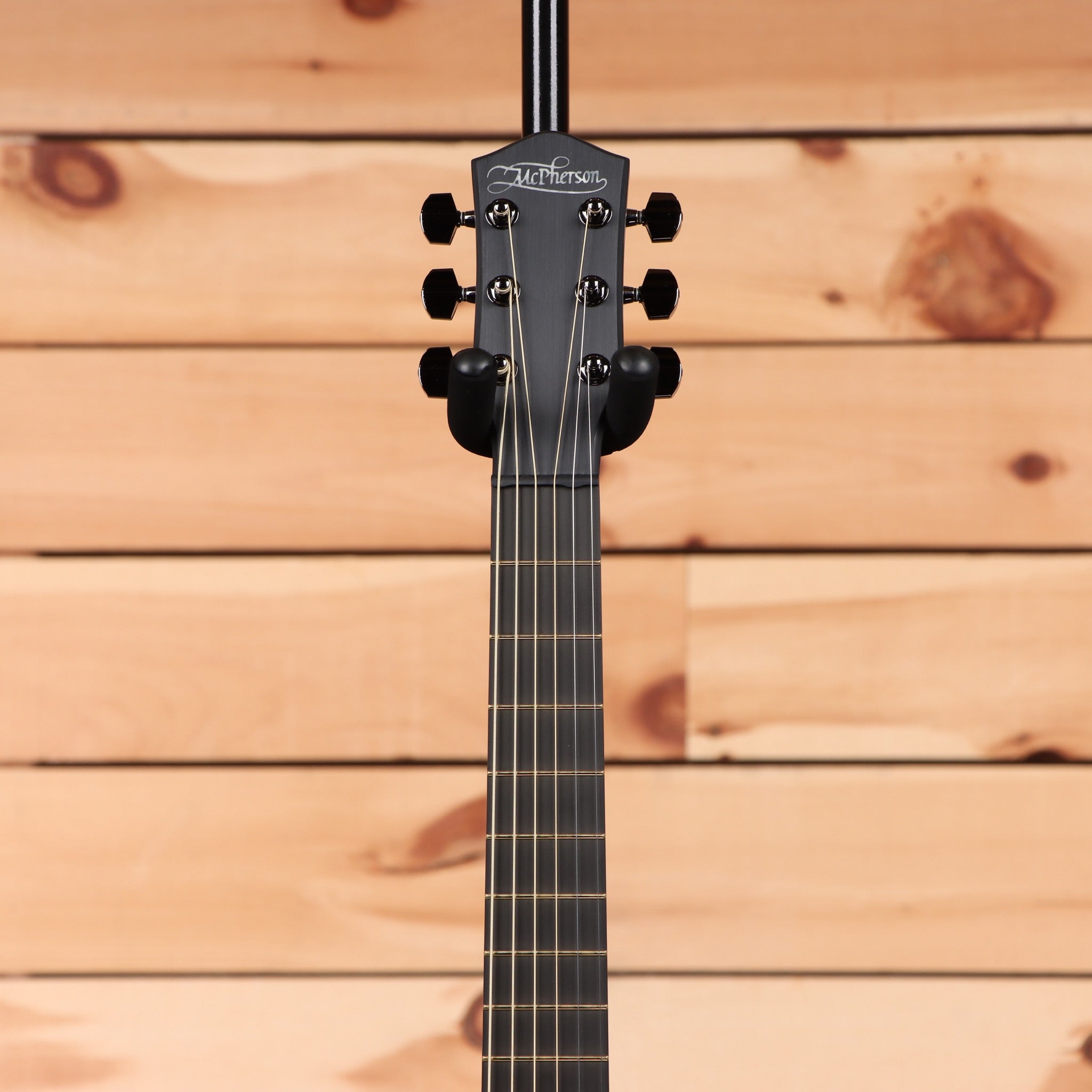McPherson Carbon Touring Camo acoustic guitar with cutaway and rosewood fretboard