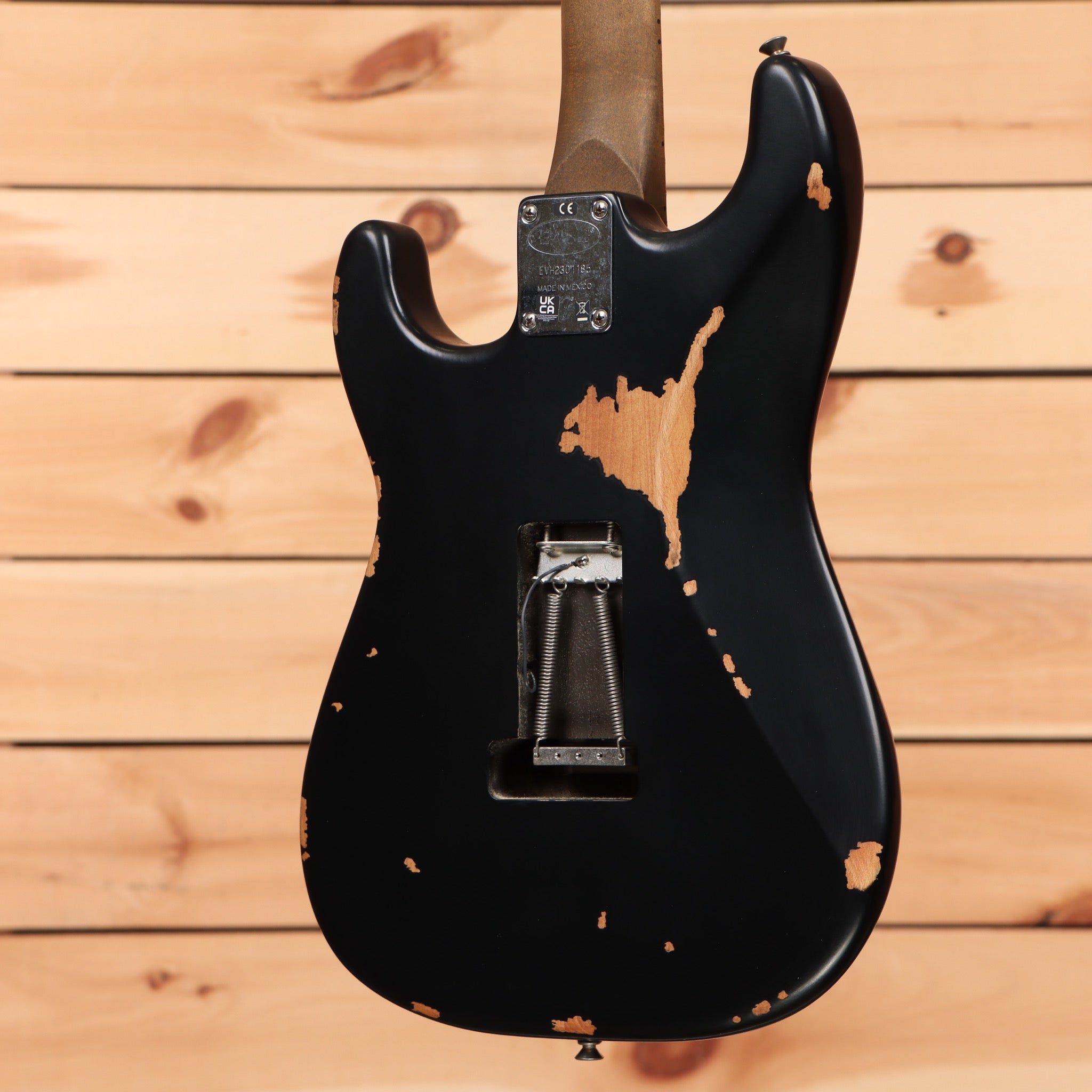EVH Frankenstein Relic Series electric guitar black finish with aged wood grain detail and bridge pickup