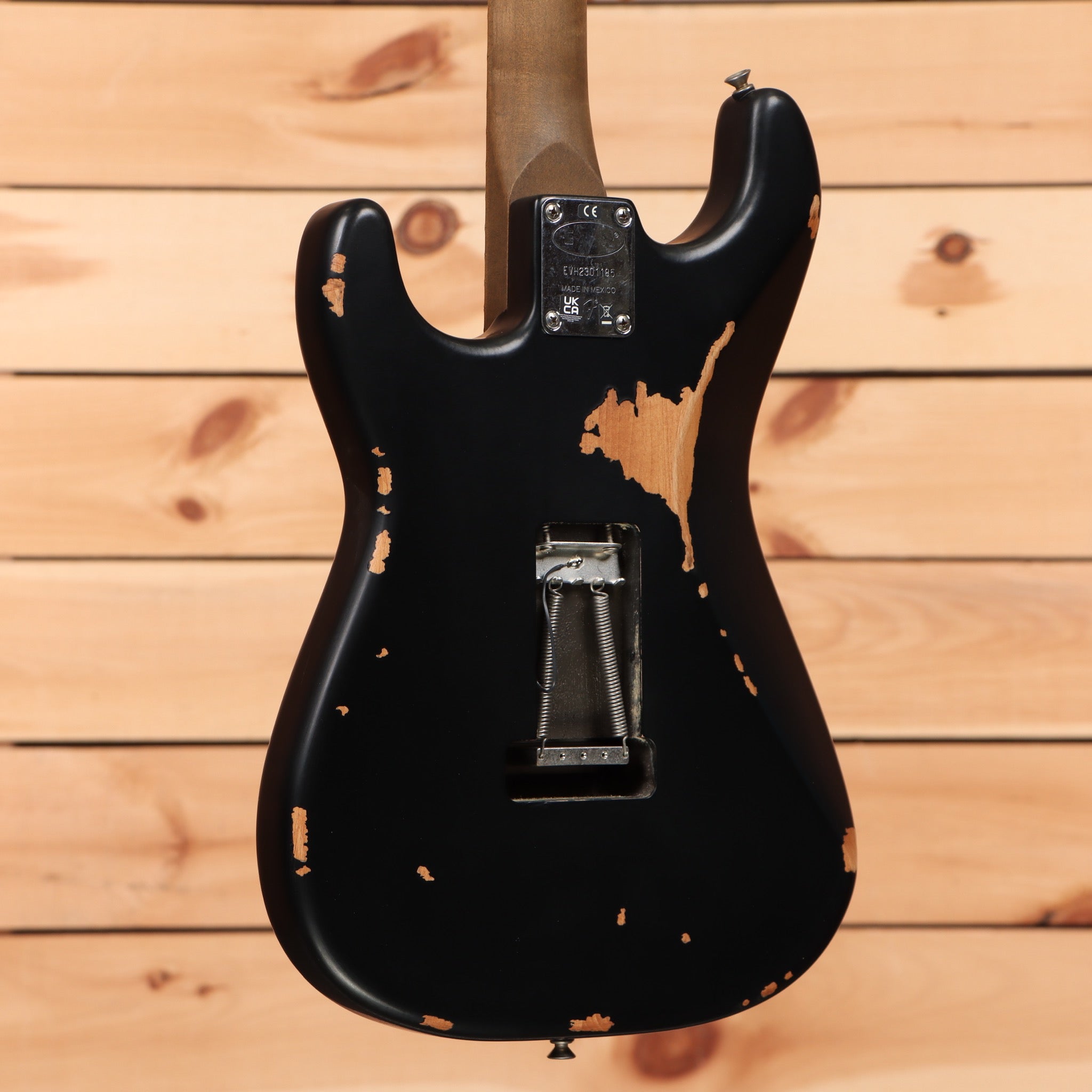 EVH Frankenstein Relic Series black electric guitar with aged finish and tremolo bridge