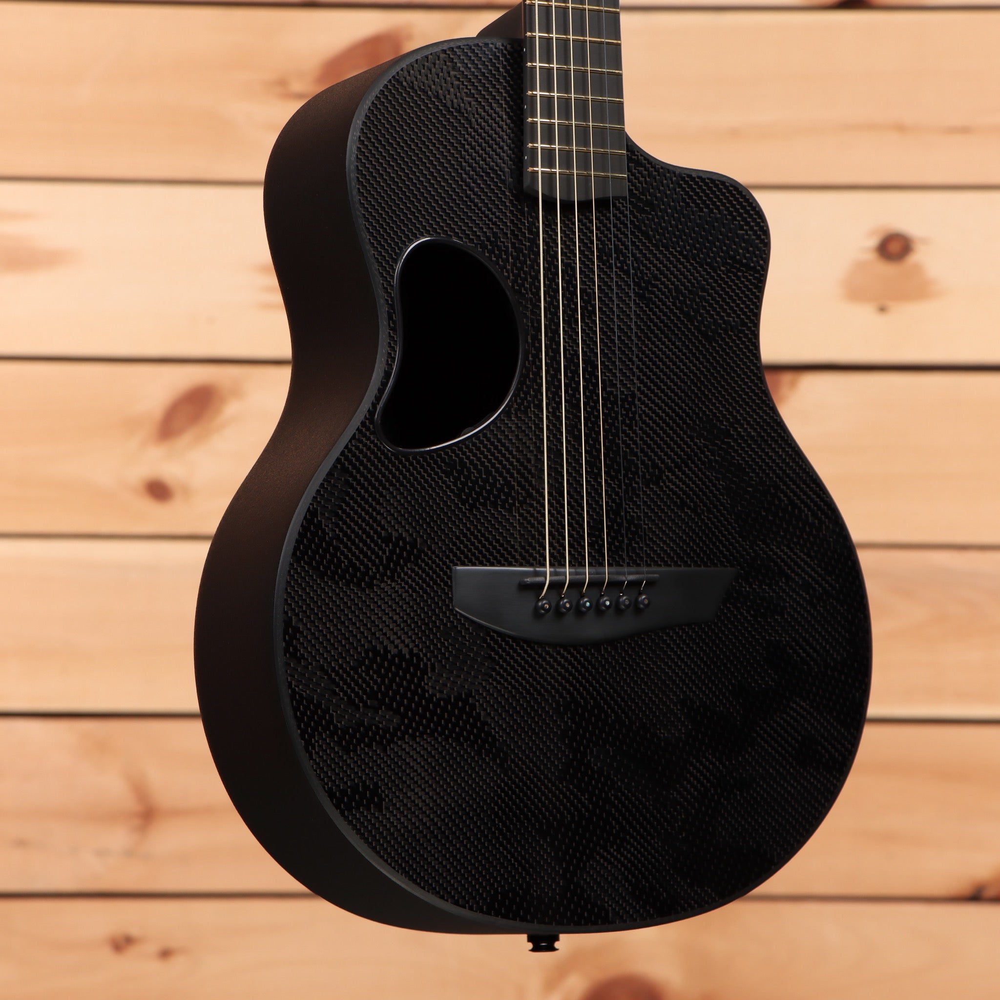 McPherson Carbon Touring Camo acoustic guitar with carbon fiber top and cutaway body