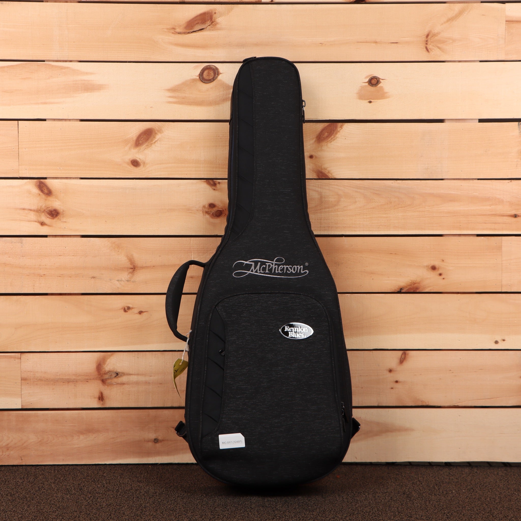McPherson Carbon Touring acoustic guitar case black with shoulder straps and protective padding