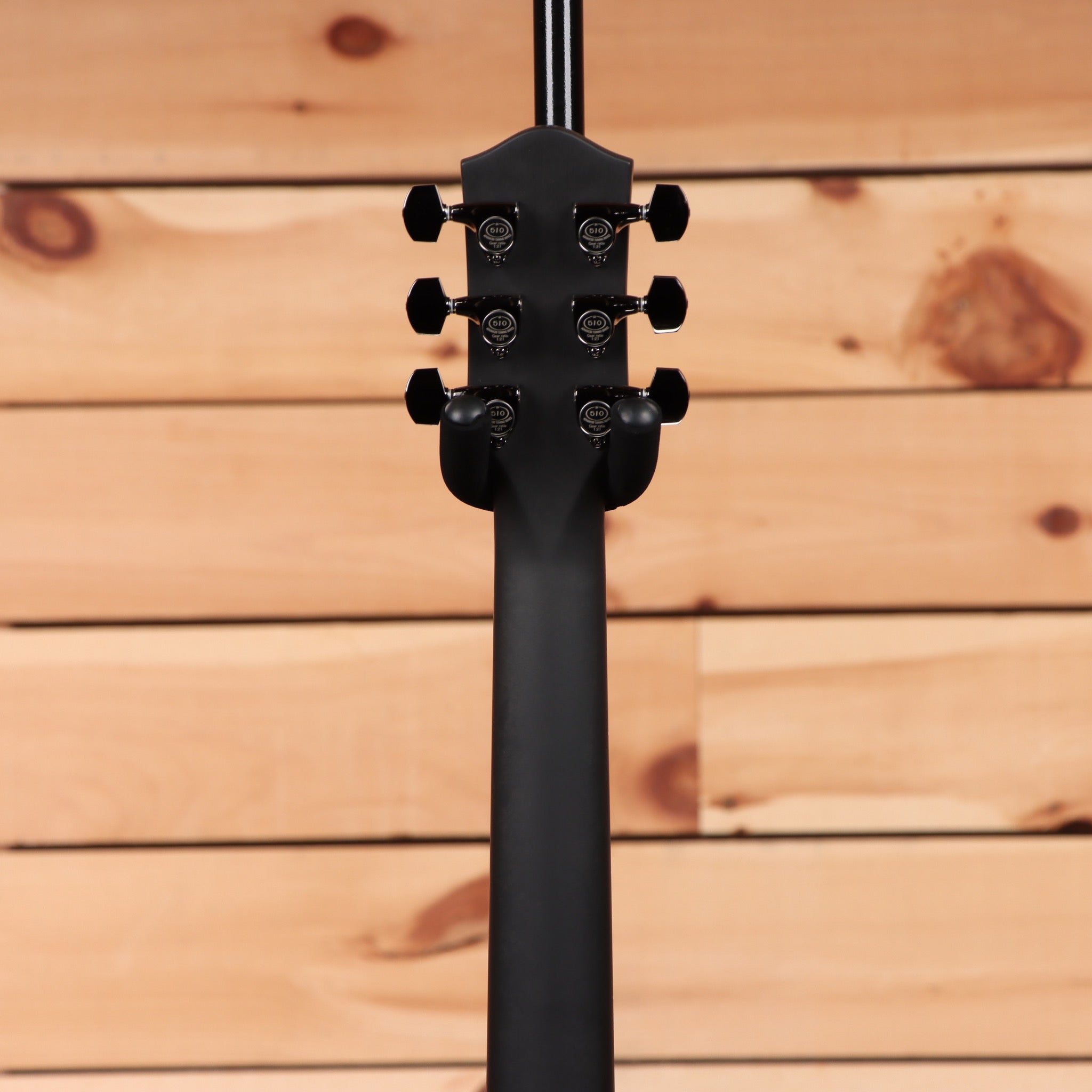 McPherson Carbon Touring Camo acoustic guitar with carbon fiber construction and six-string headstock tuners
