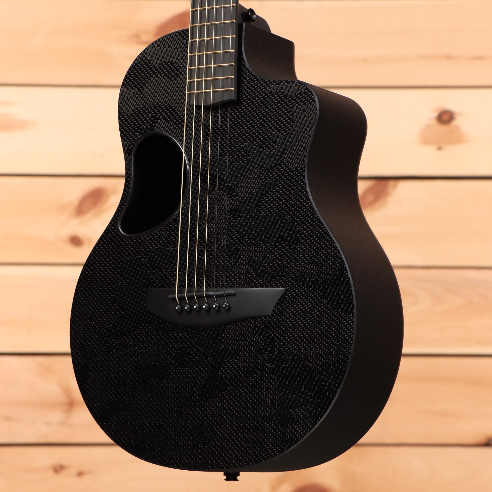 McPherson Carbon Touring Camo acoustic guitar with carbon fiber body and cutaway design