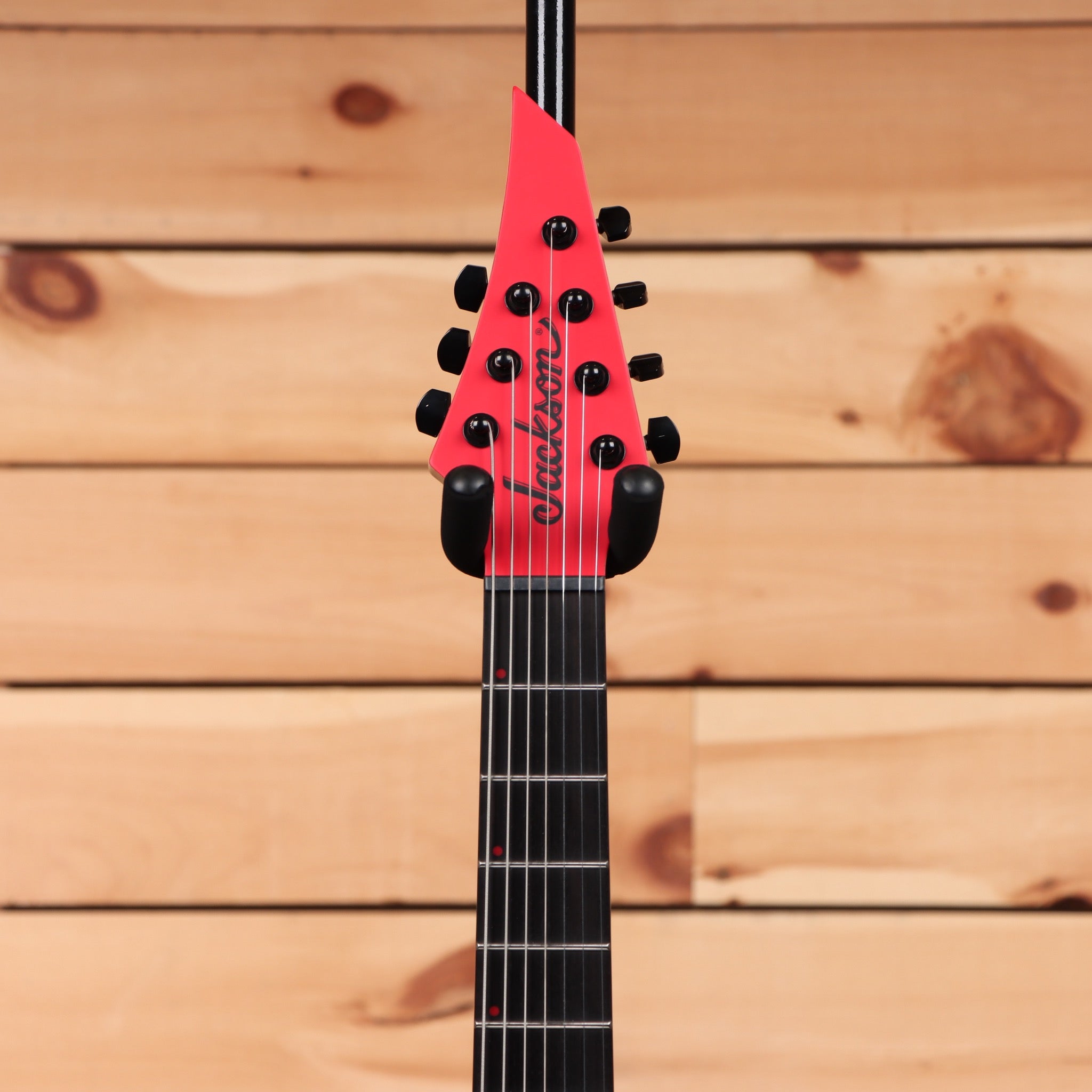 Jackson Pro Plus Series Dinky MDK7 HT 7-string electric guitar satin red with black bevels and humbucker pickups
