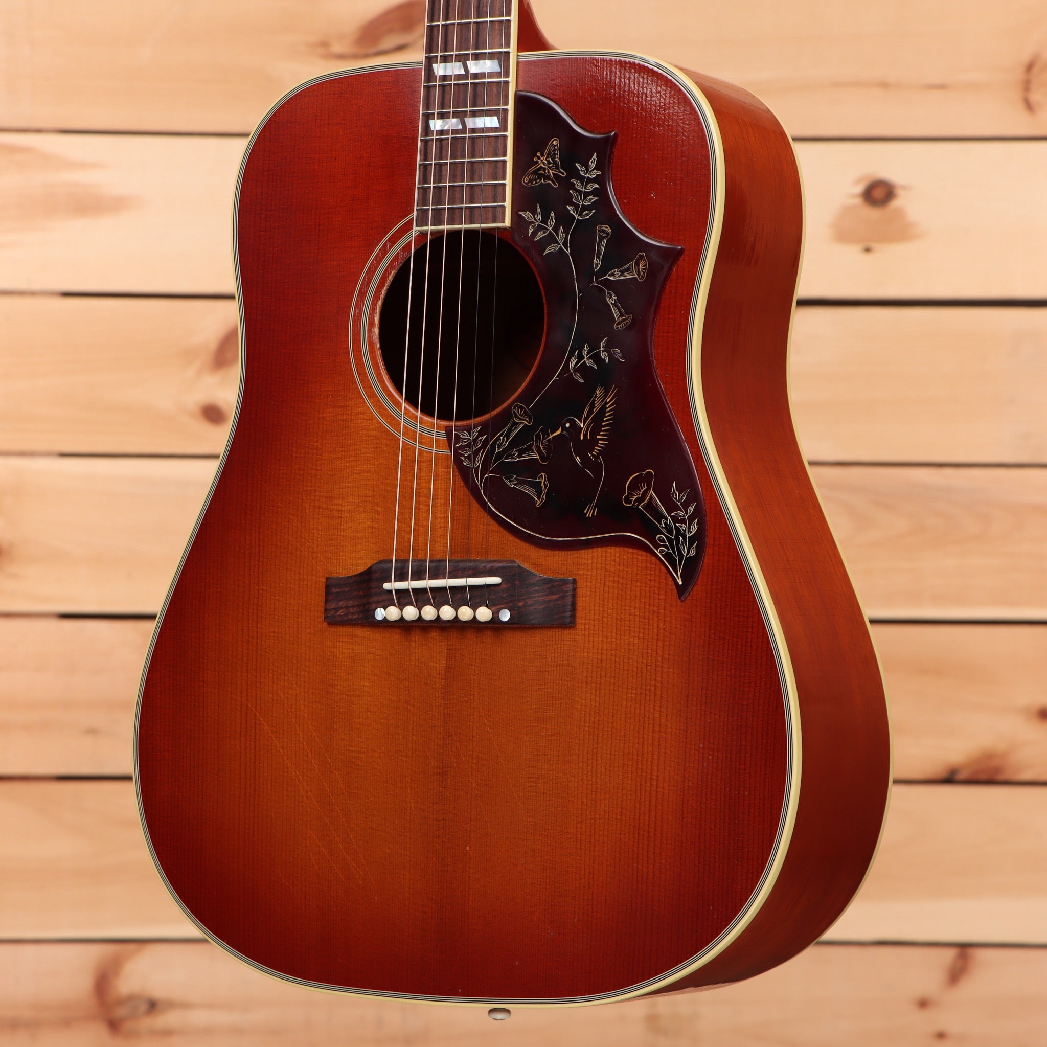 Gibson Hummingbird acoustic guitar light-aged Heritage Cherry Sunburst with floral pickguard inlay