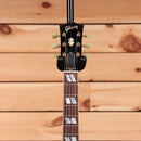 Gibson 1960 Hummingbird light-aged Heritage Cherry Sunburst acoustic guitar with maple inlays and gold tuners