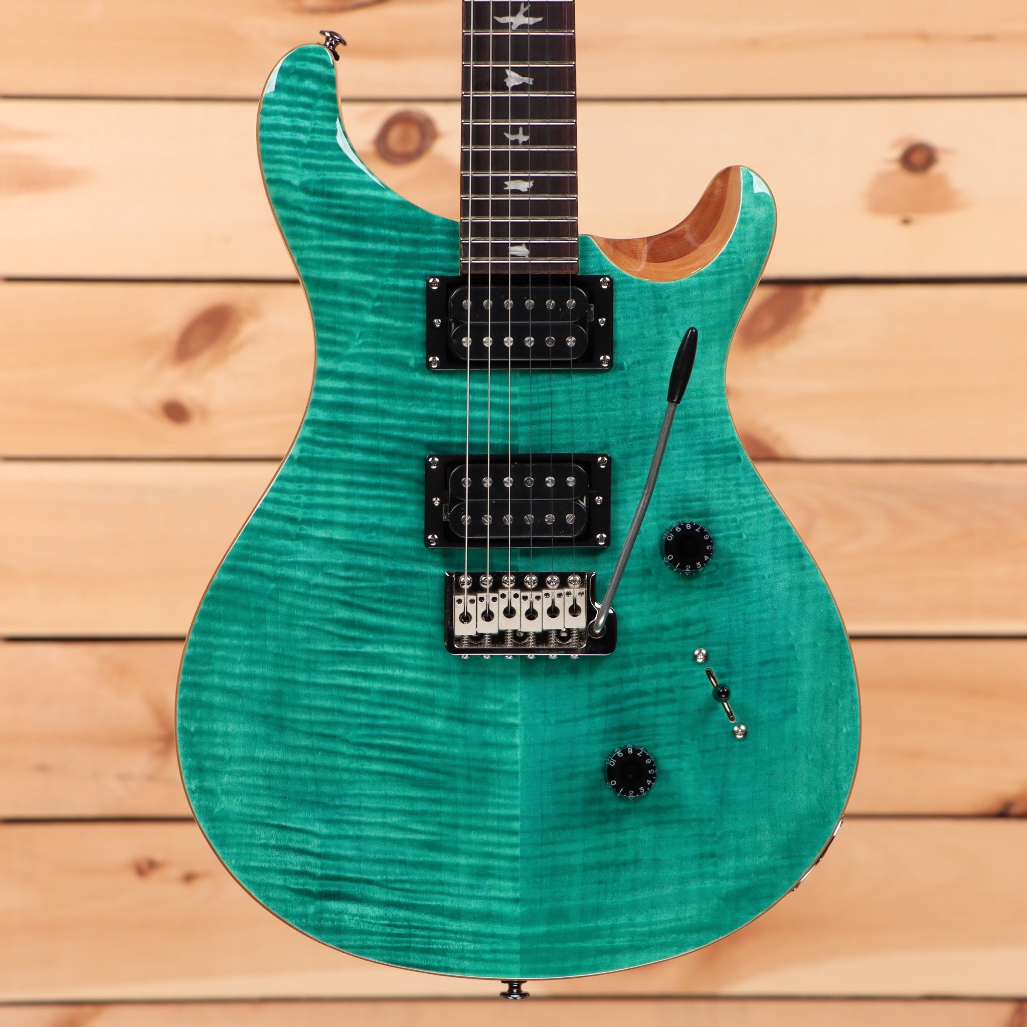Paul Reed Smith SE Custom 24 turquoise electric guitar with flamed maple top and dual humbuckers