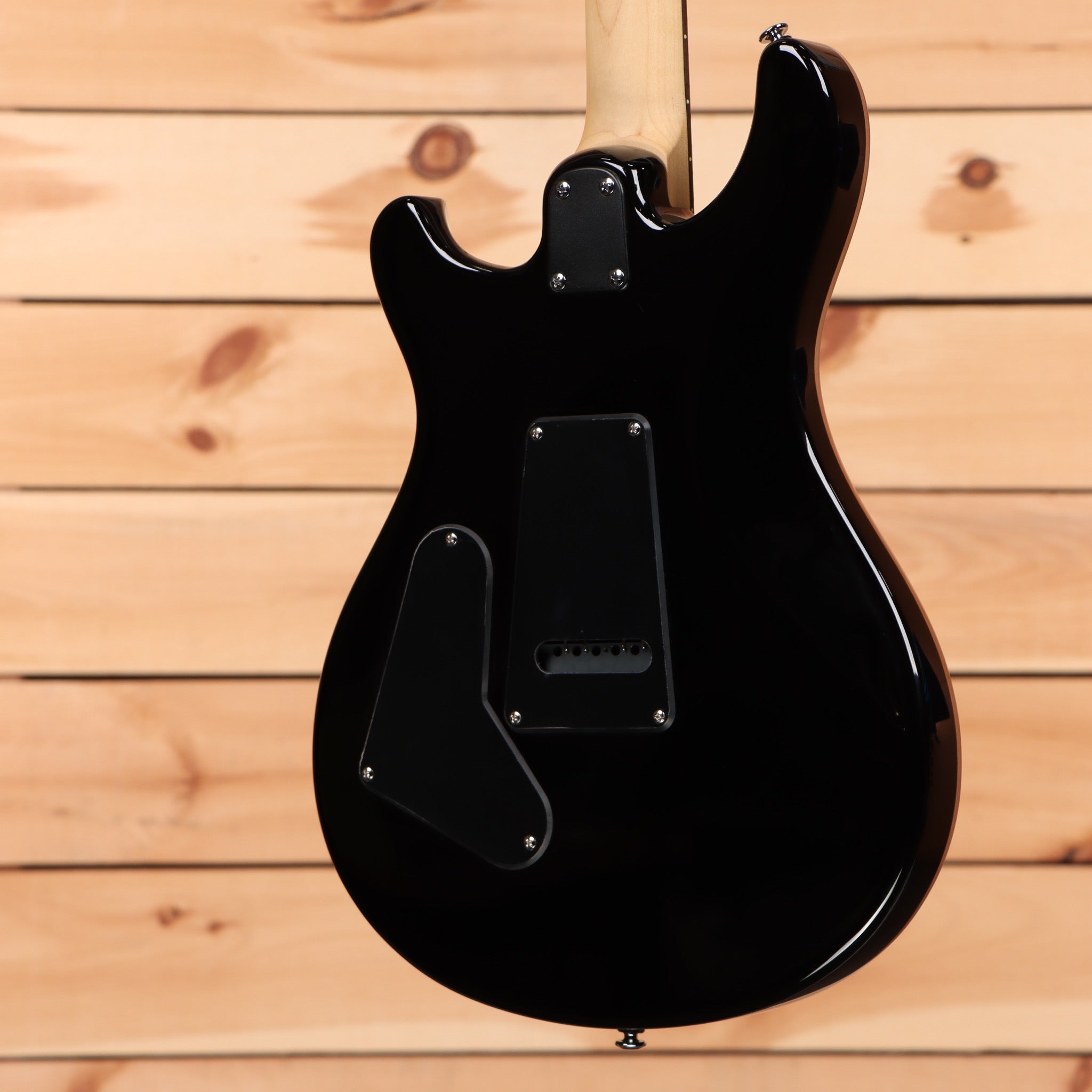Paul Reed Smith SE CE 24 black electric guitar with single-coil pickups and semi-hollow body design