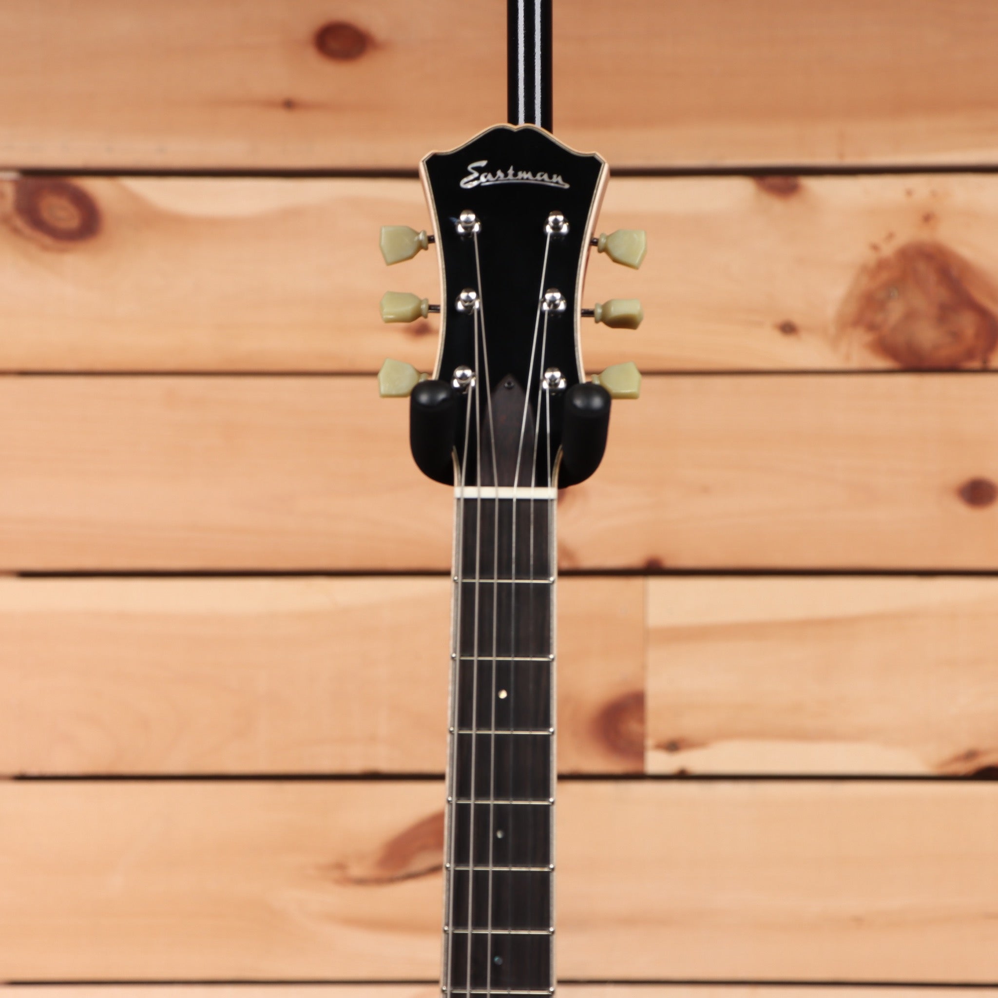 Eastman T186MX classical guitar black finish with pale green tuning pegs