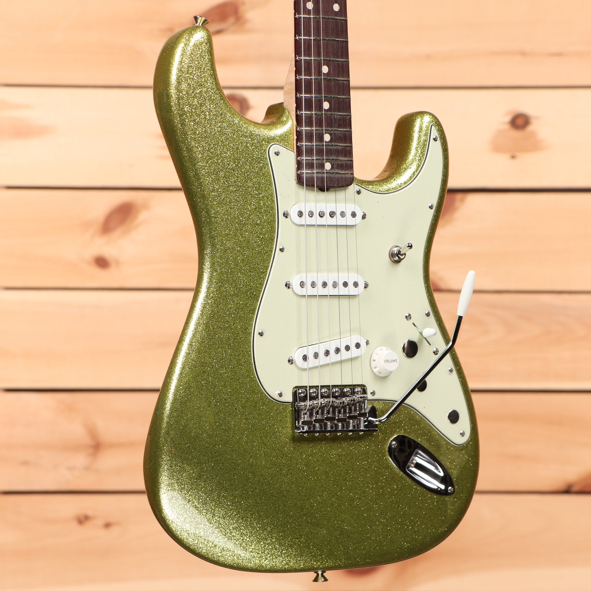 Fender Custom Shop Dick Dale Stratocaster electric guitar Chartreuse Sparkle with white pickguard and single-coil pickups