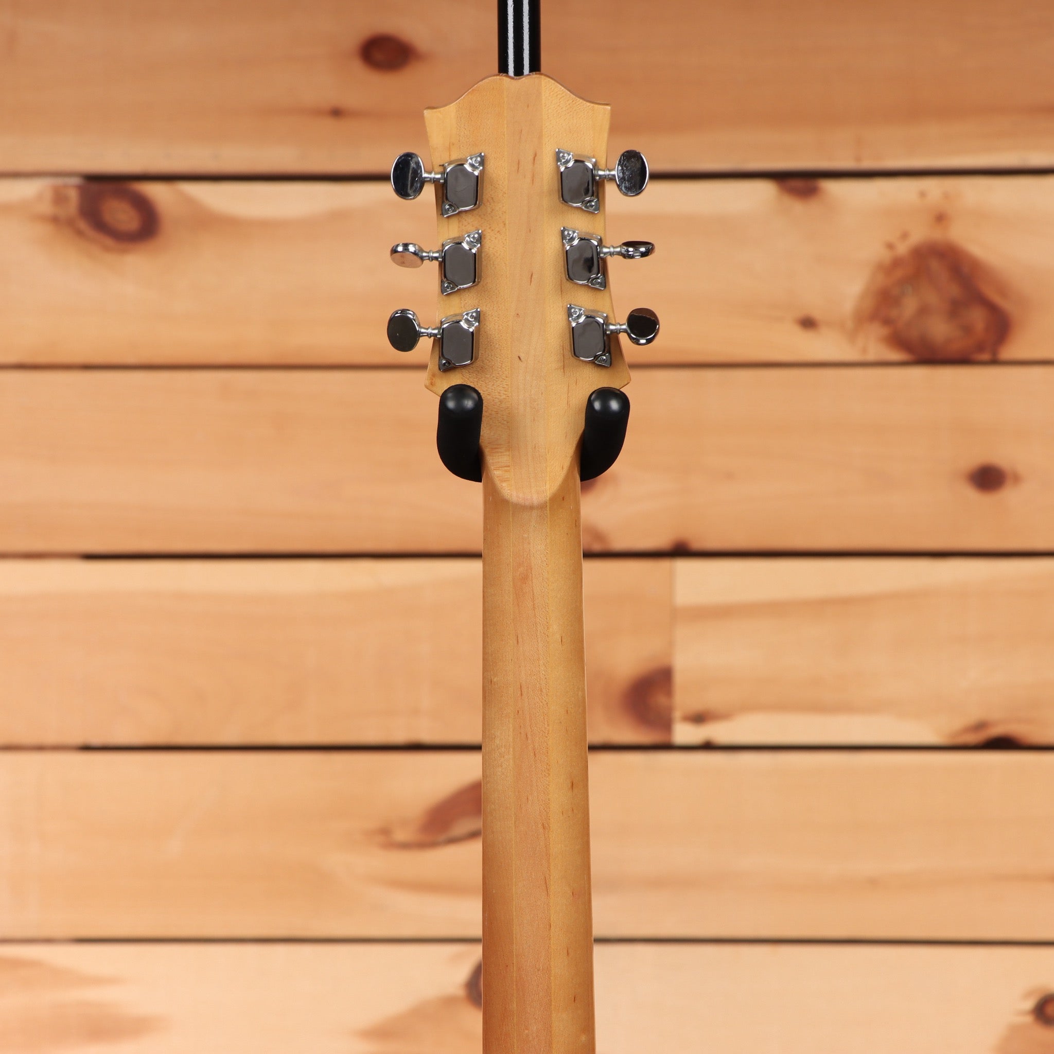 Epiphone FT-570BL acoustic guitar Natural finish rear headstock view with chrome tuners and maple neck