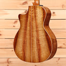 Taylor Custom Grand Auditorium acoustic guitar natural finish with white binding and flamed maple back