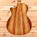 Taylor Custom Grand Auditorium acoustic guitar natural finish with figured wood back and sides