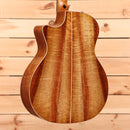 Taylor Custom Grand Auditorium acoustic guitar natural finish with figured wood back