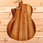 Taylor Custom Grand Auditorium acoustic guitar natural finish with figured wood back