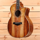 Taylor Custom Grand Auditorium acoustic guitar natural finish with figured koa top and venetian cutaway