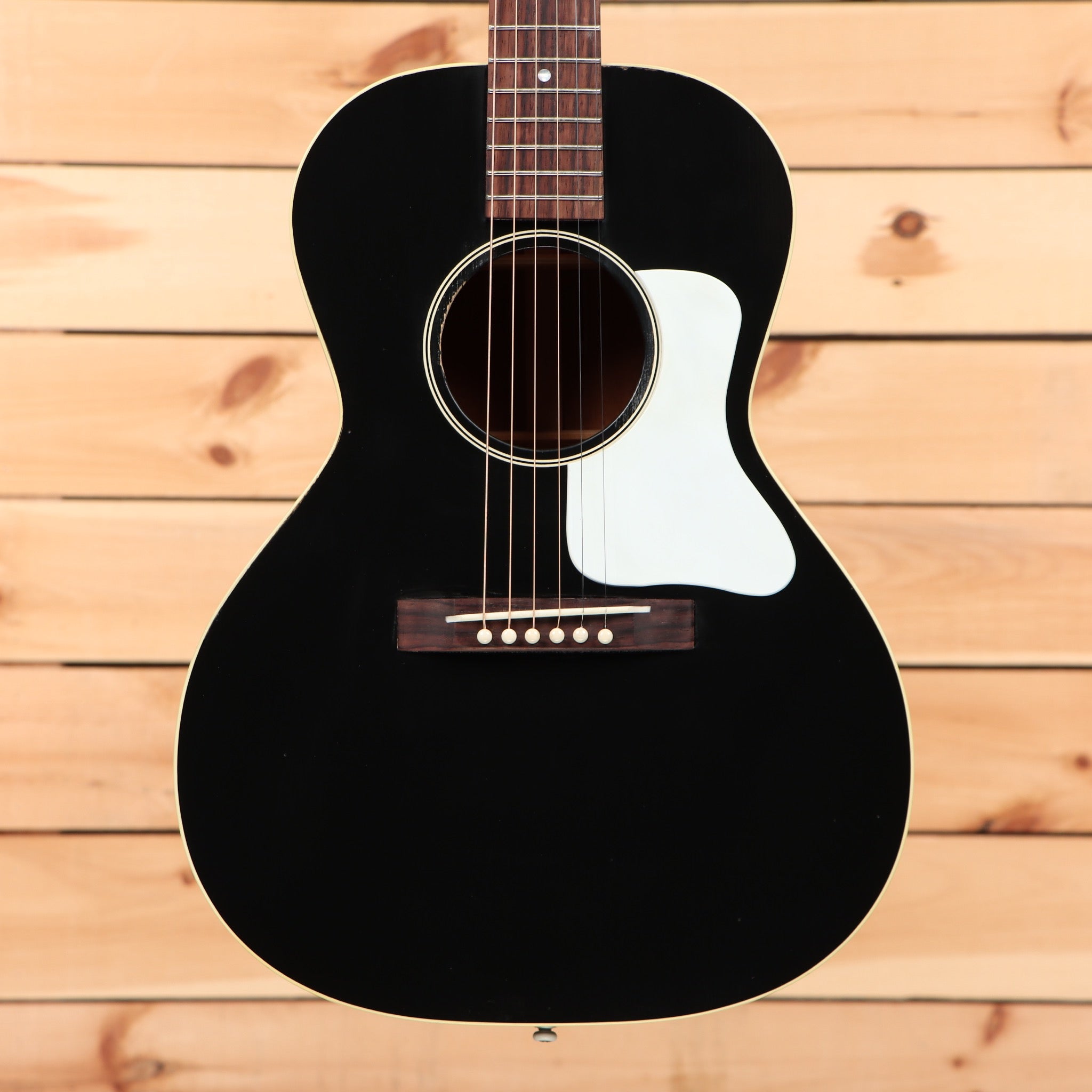 Gibson 1933 L00 acoustic guitar light aged ebony with white pickguard and rosewood fretboard