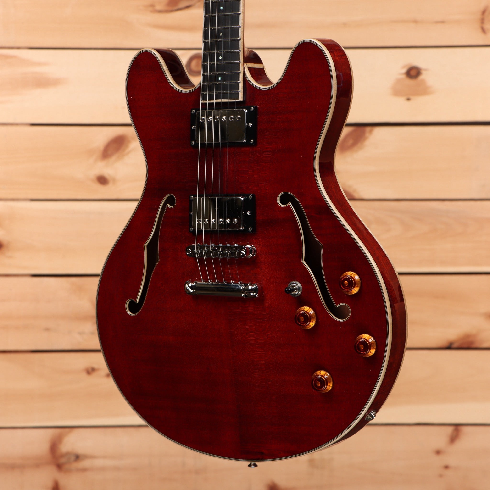 Eastman T186MX Classic semi-hollow body electric guitar wine red finish with f-holes and amber knobs