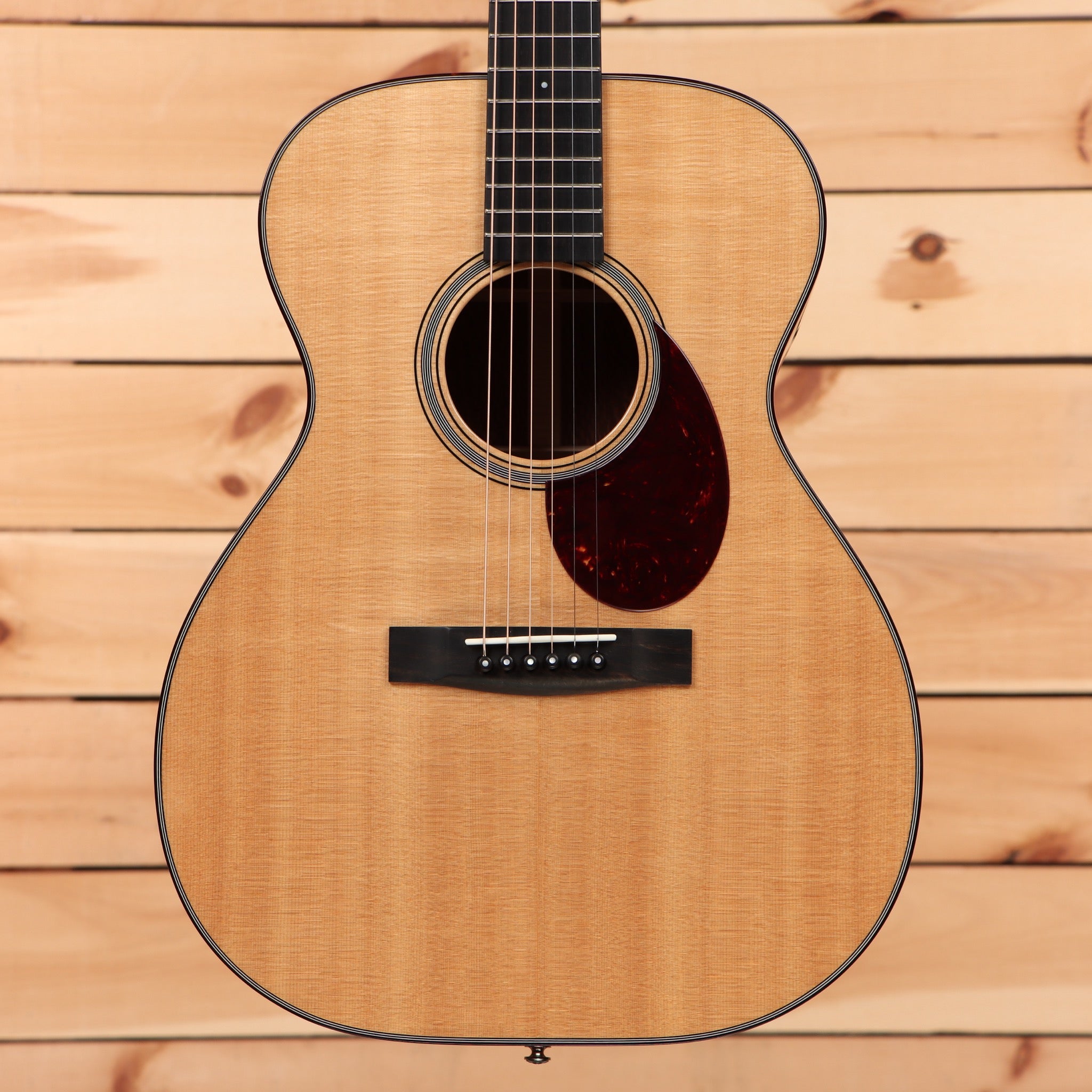 Huss and Dalton Tom Custom natural acoustic guitar with mahogany back and sides