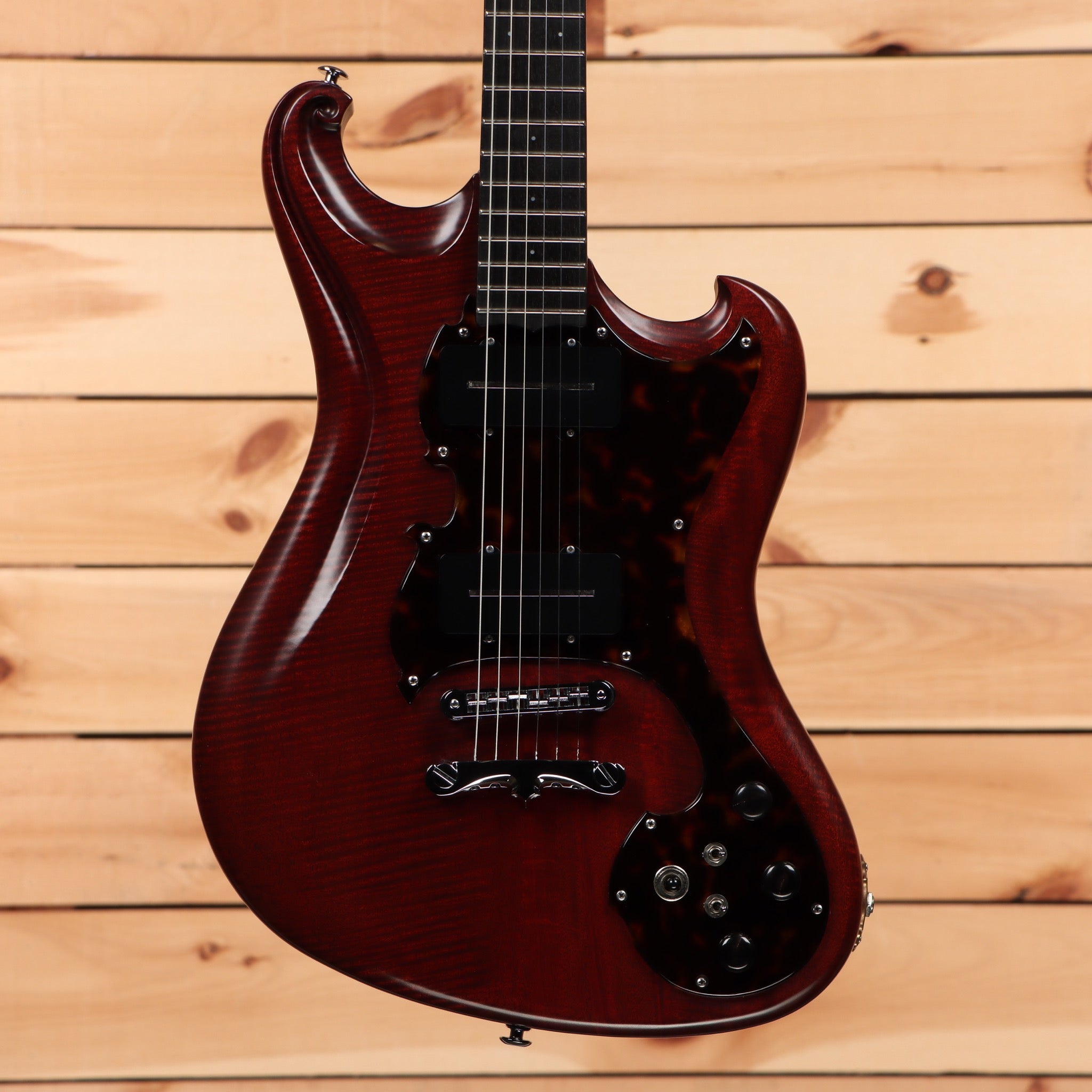 Scott Walker Phoenix mahogany electric guitar with flamed maple top and black pickguard