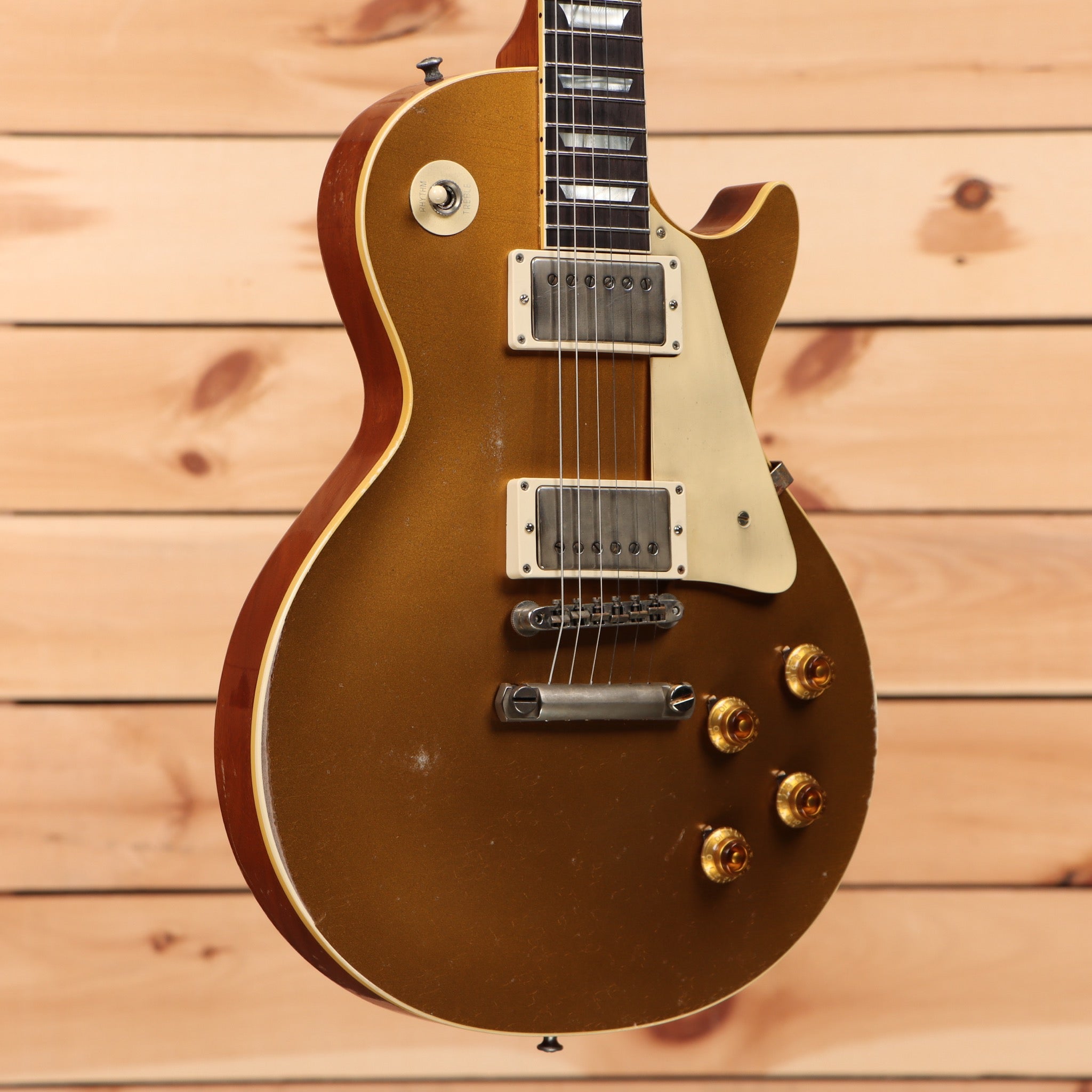 Gibson 1957 Les Paul Ultra Heavy Aged Double Gold electric guitar with gold hardware and dual humbuckers
