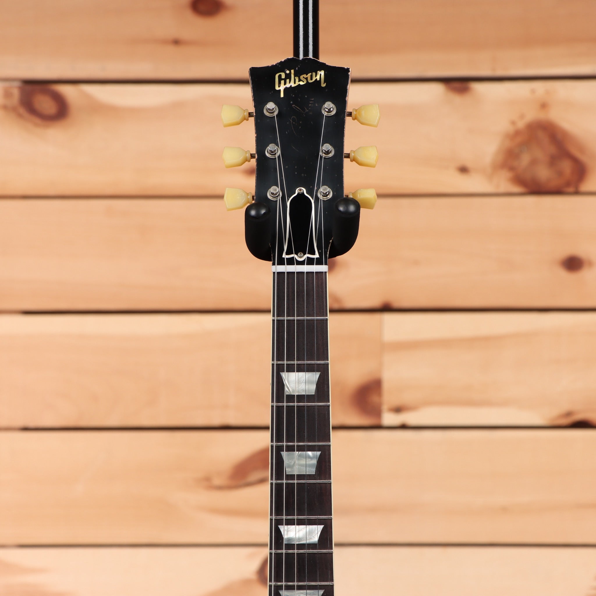 Gibson 1957 Les Paul Ultra Heavy Aged Double Gold electric guitar with dual humbuckers and gold tuning pegs