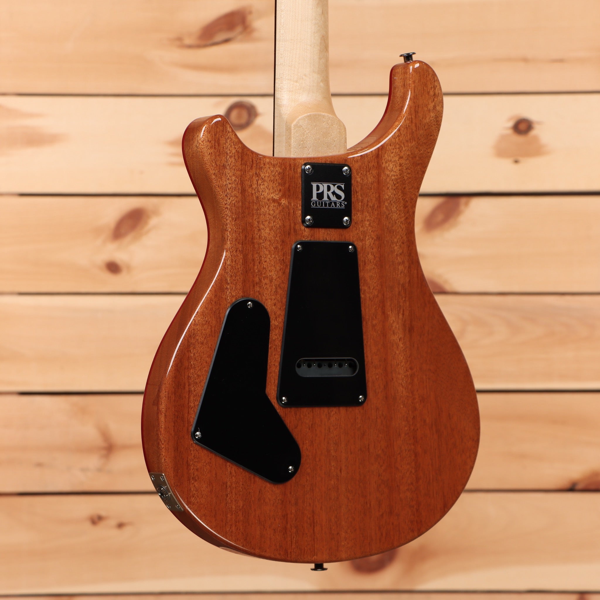 Paul Reed Smith CE 24 electric guitar Terracotta Metallic with single-coil pickup and mahogany body