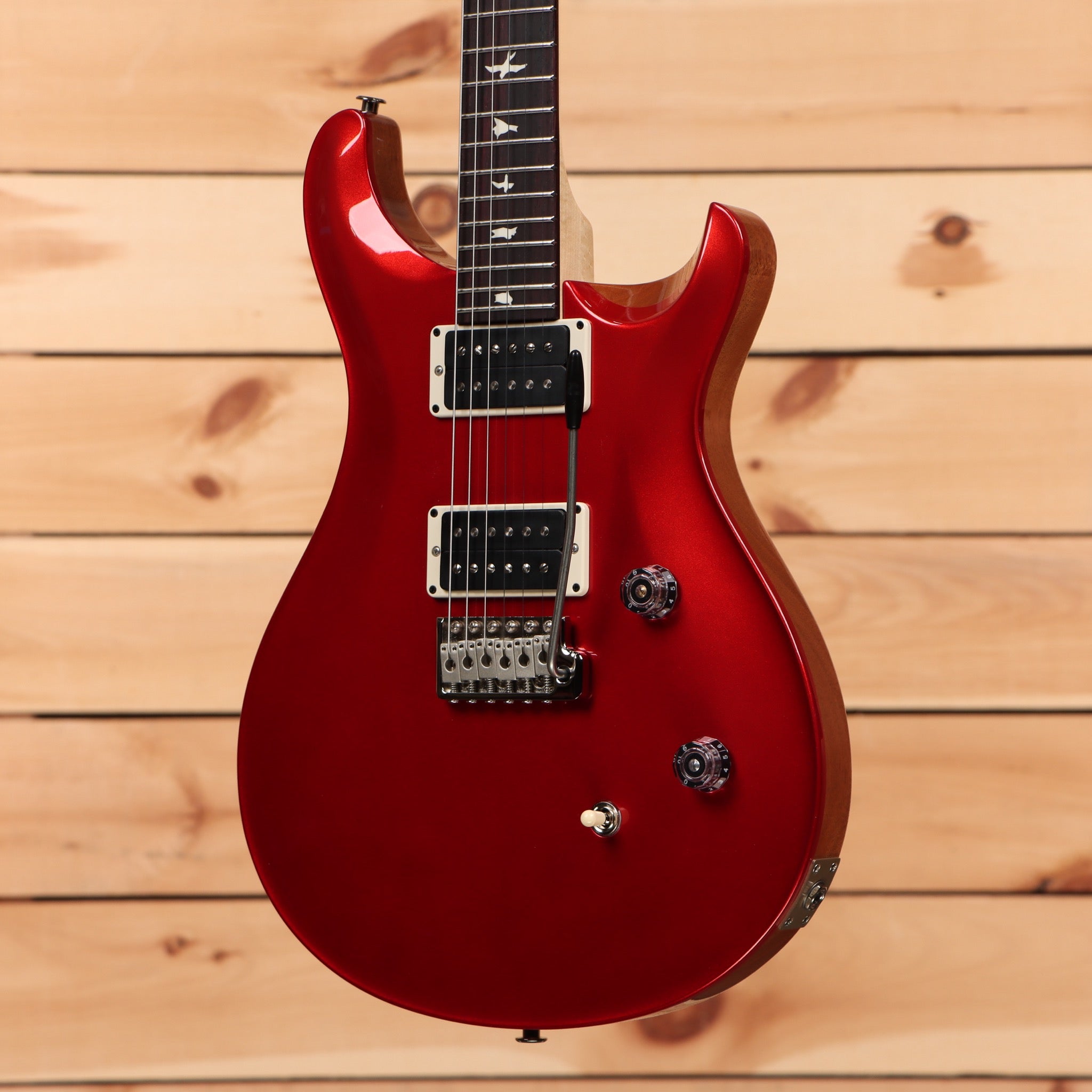 Paul Reed Smith CE-24 electric guitar Terracotta Metallic with dual humbuckers and tremolo bridge