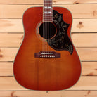 Gibson 1960 Hummingbird light aged heritage cherry sunburst dreadnought acoustic guitar with black pickguard floral inlay