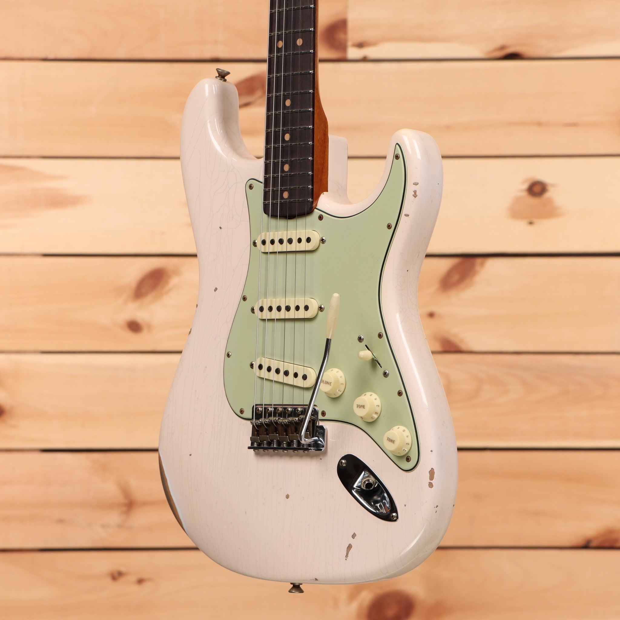 Fender Custom Shop Limited 1963 Stratocaster Relic electric guitar Super Faded Aged Shell Pink with mint green pickguard