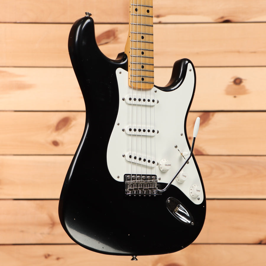 Fender Custom Shop Dennis Galuszka Masterbuilt 1956 Stratocaster Journeyman Relic electric guitar black with white pickguard and single-coil pickups
