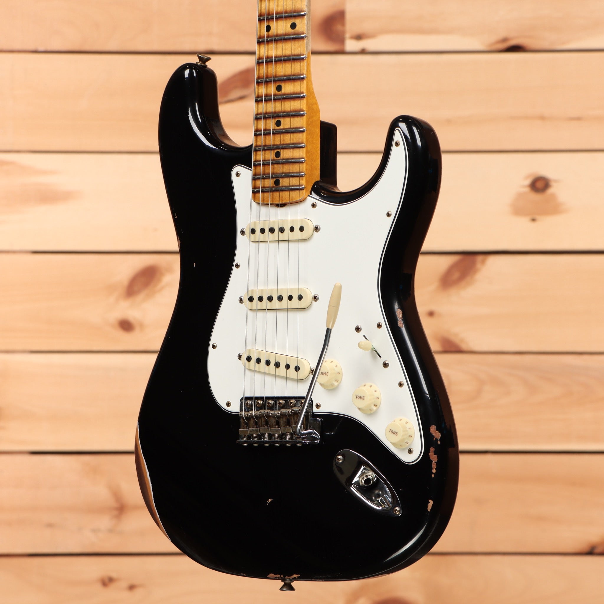 Fender Custom Shop Limited 1962 Stratocaster relic aged black electric guitar with single-coil pickups and maple neck