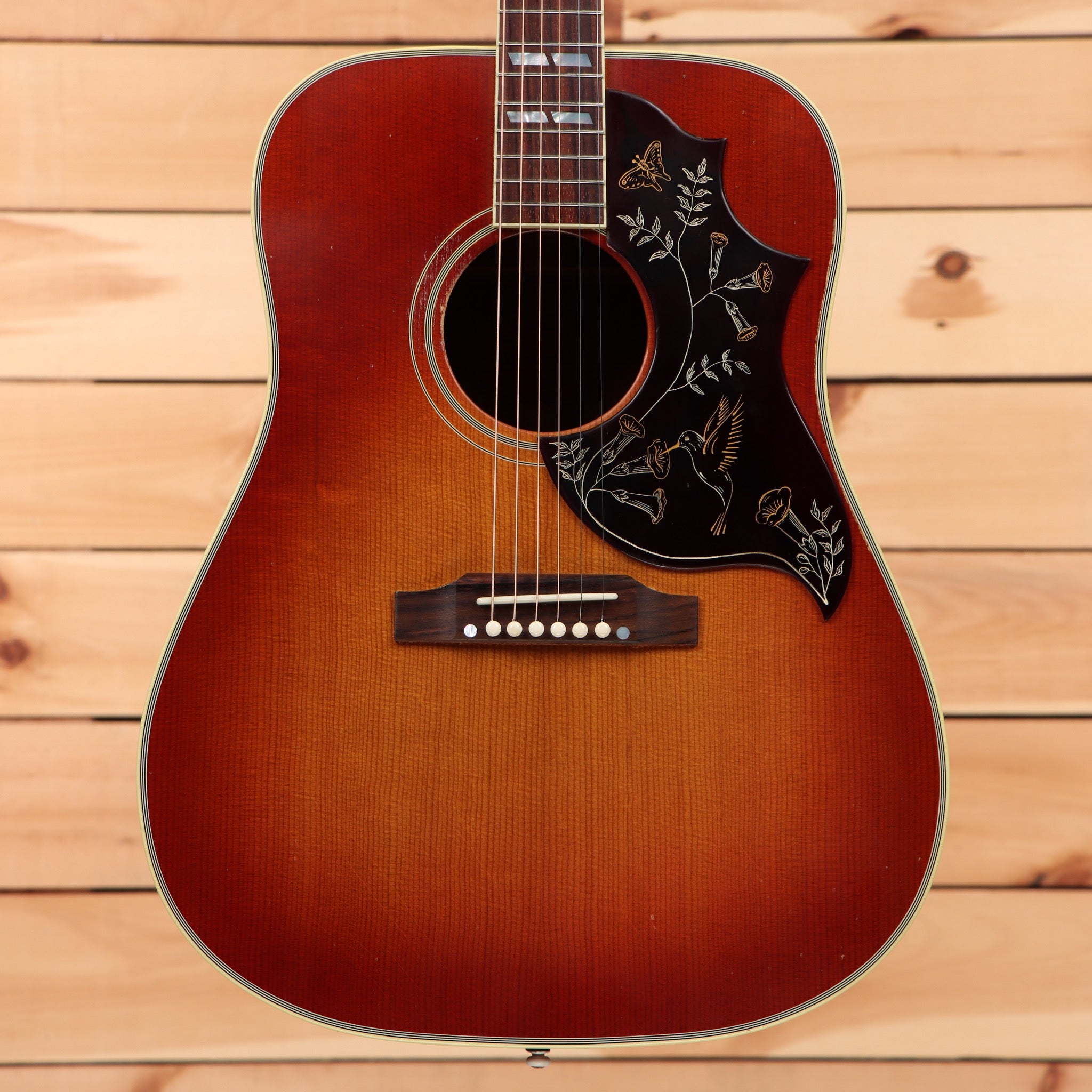 Gibson 1960 Hummingbird pre-owned acoustic guitar Heritage Cherry Sunburst with black pickguard floral inlay