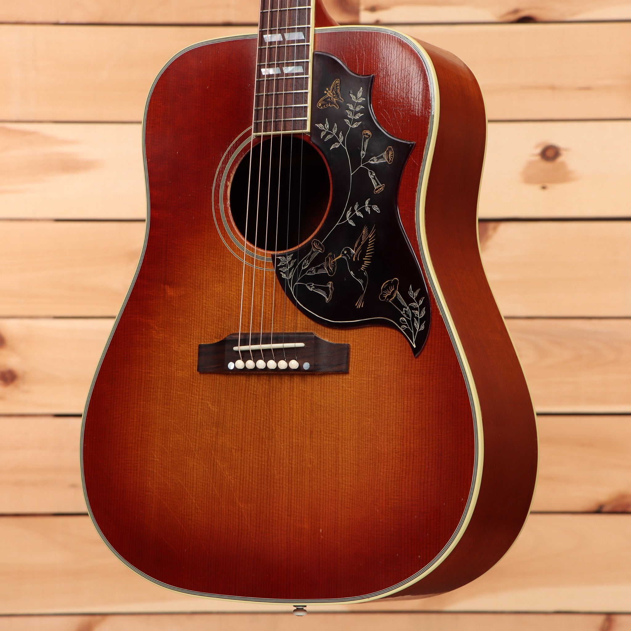 Pre-owned Gibson 1960 Hummingbird acoustic guitar Heritage Cherry Sunburst with black pickguard inlay