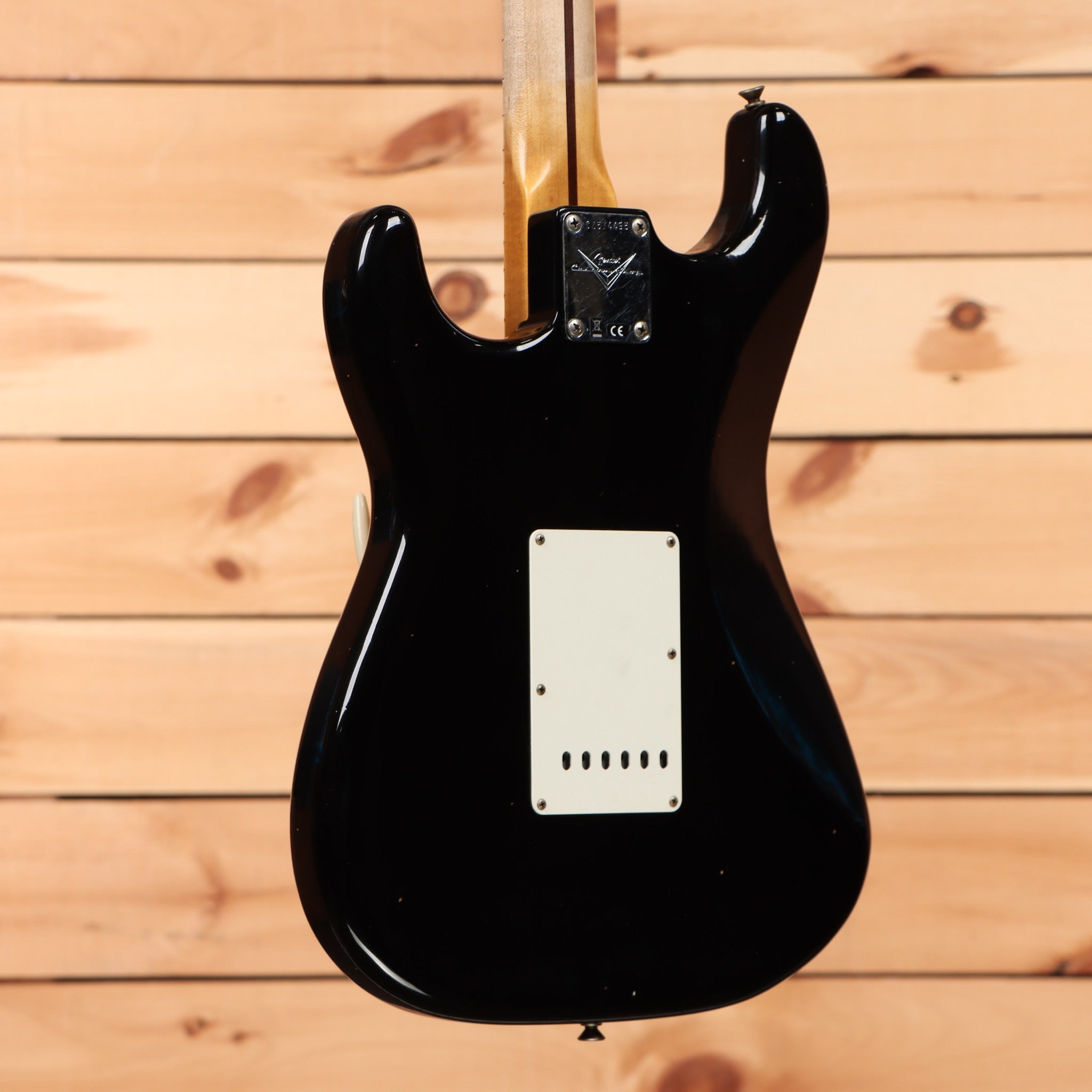 Fender Custom Shop 1956 Stratocaster Journeyman Relic Aged Black electric guitar with white pickguard