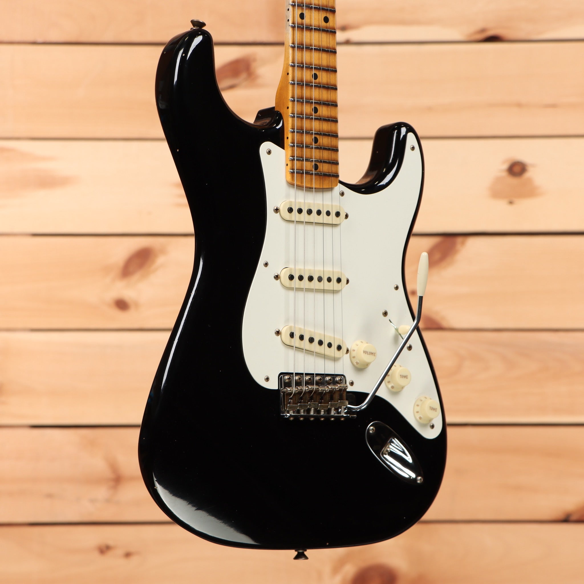 Fender Custom Shop 1956 Stratocaster Journeyman Relic electric guitar aged black with white pickguard and single-coil pickups