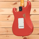 Fender Custom Shop Limited 1960 Stratocaster Relic electric guitar Tahitian Coral with white pickguard and single-coil pickups