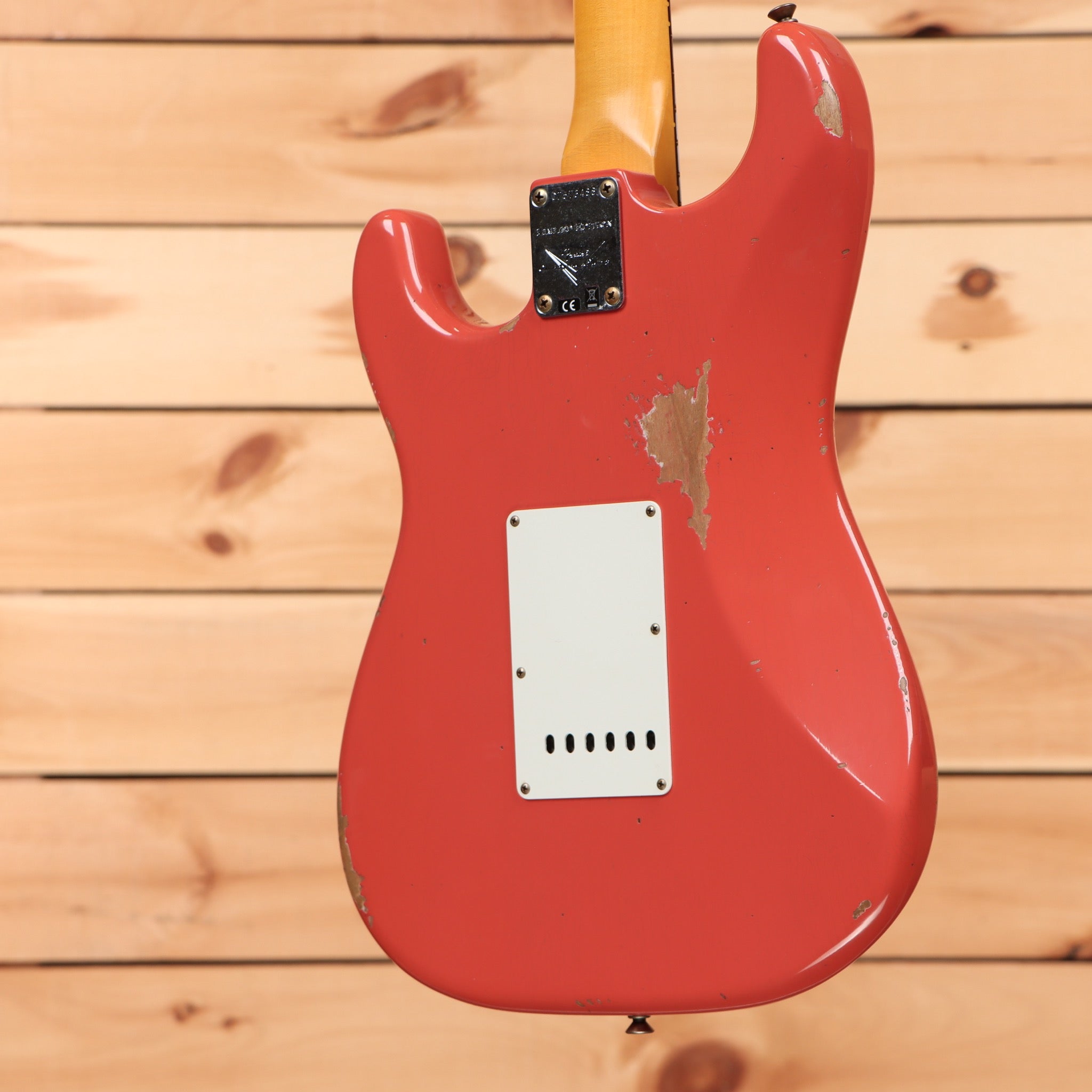 Fender Custom Shop Limited 1960 Stratocaster Relic electric guitar Tahitian Coral with white pickguard and single-coil pickups