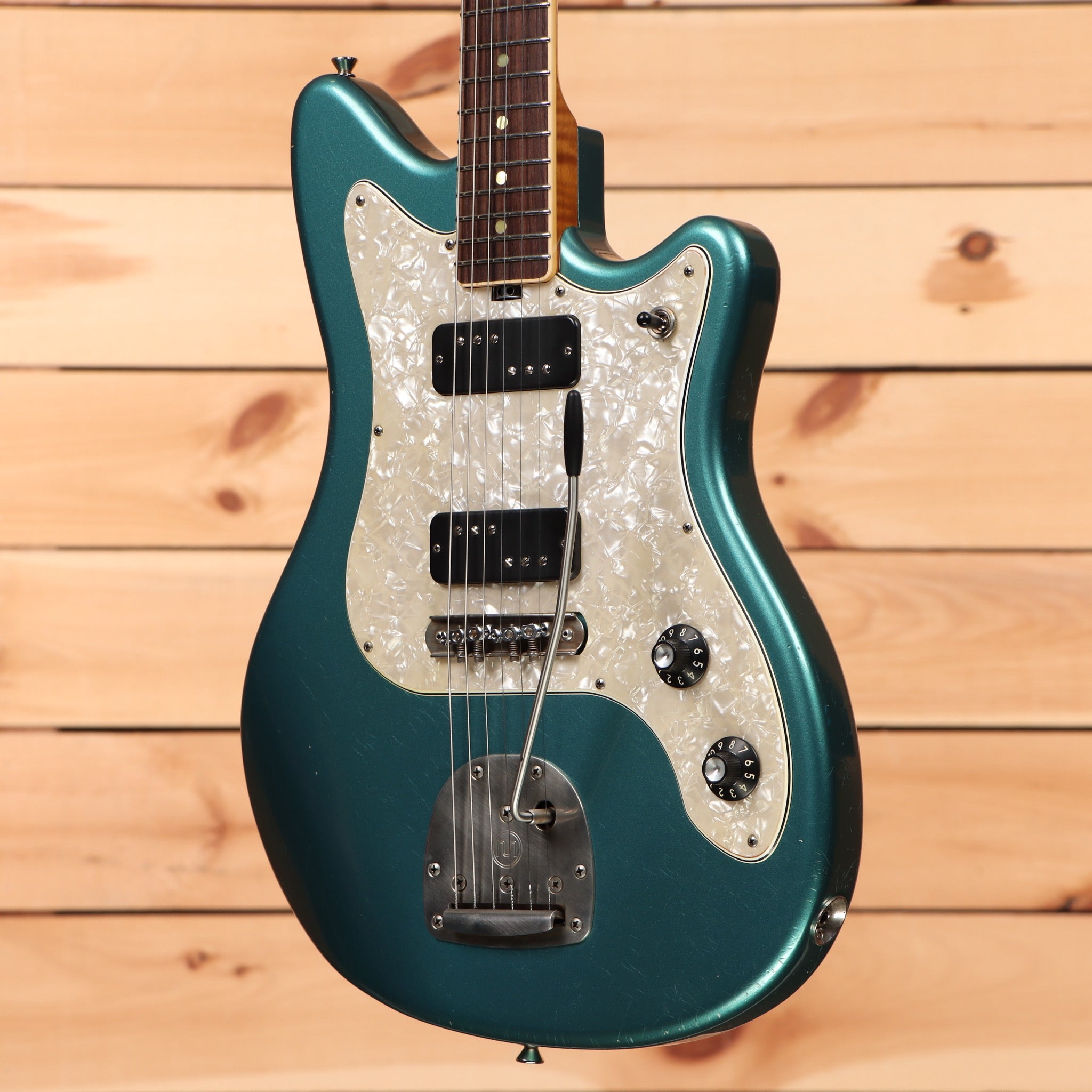 Shabat Namm 2024 Puma Ocean Turquoise electric guitar with pearl pickguard and dual humbucker pickups